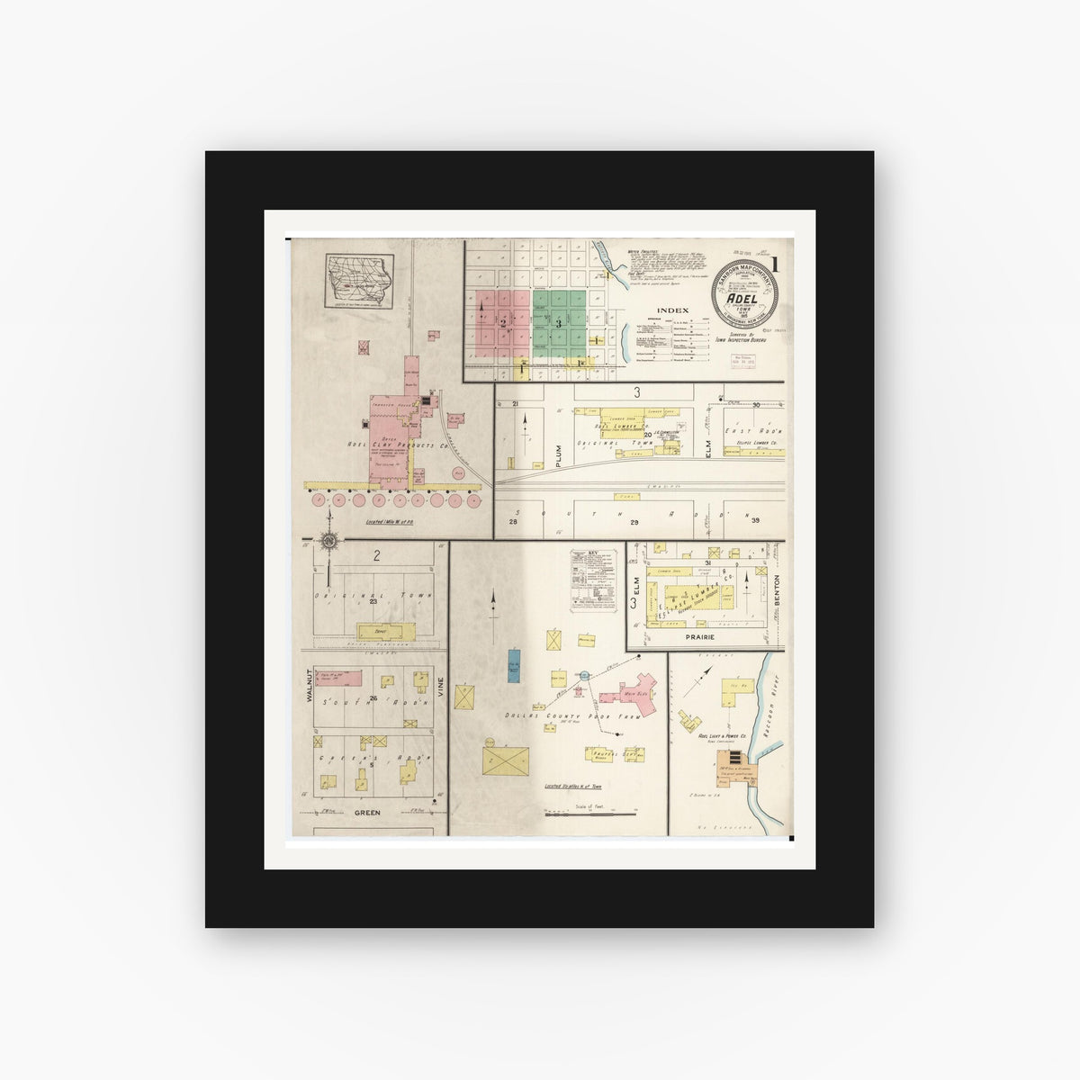 Old map wall art mockup — black gallery frame with white mat — Sanborn Fire Insurance Map from Adel, Dallas County, Iowa (1915), Sheet #0001