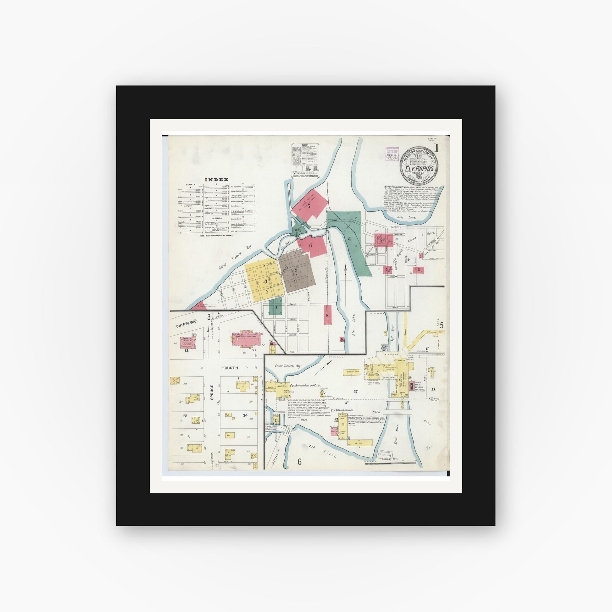 Old map wall art mockup — black gallery frame with white mat — Sanborn Fire Insurance Map from Elk Rapids, Antrim County, Michigan (1907), Sheet #0001