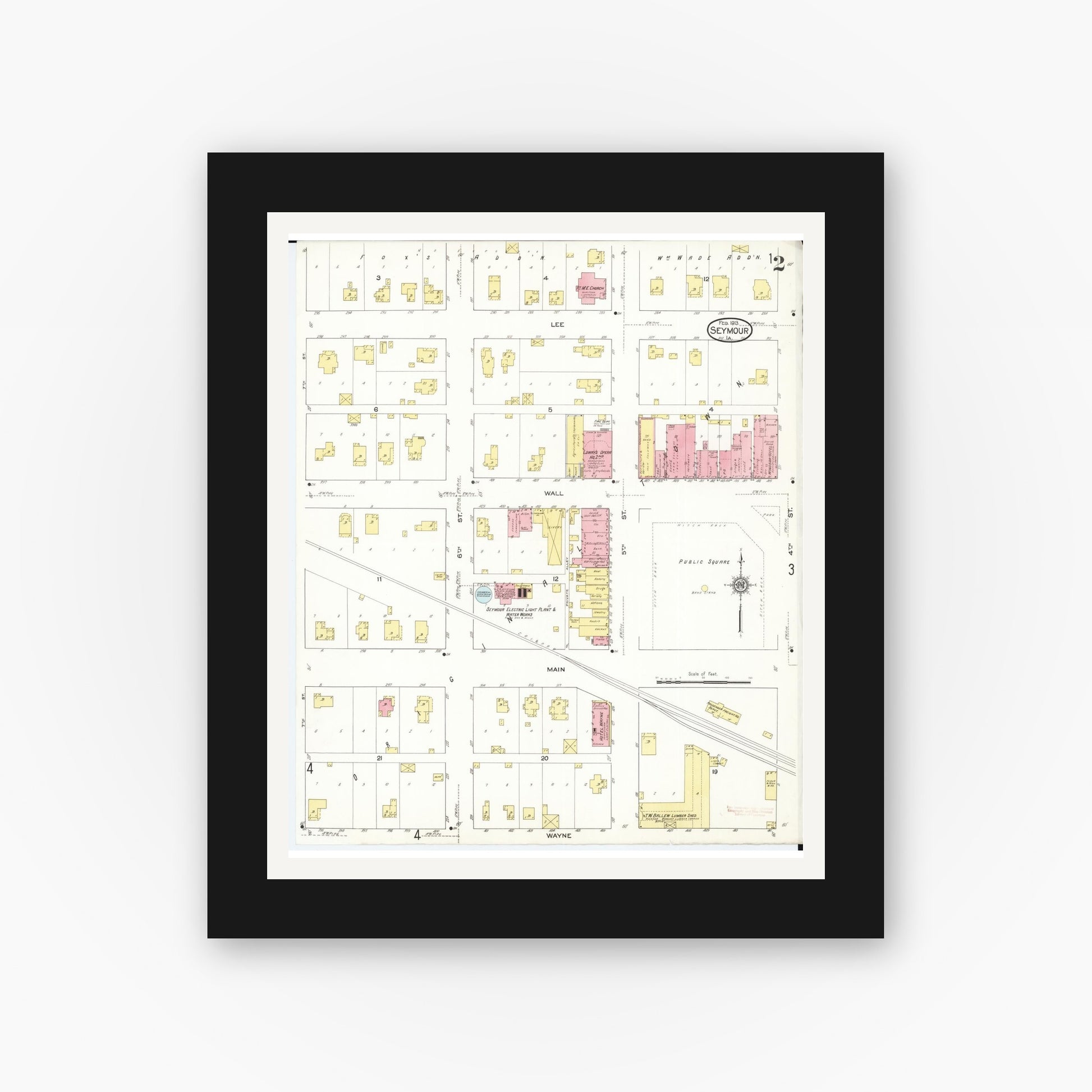 Old map wall art mockup — black gallery frame with white mat — Sanborn Fire Insurance Map from Seymour, Wayne County, Iowa (1913), Sheet #0002