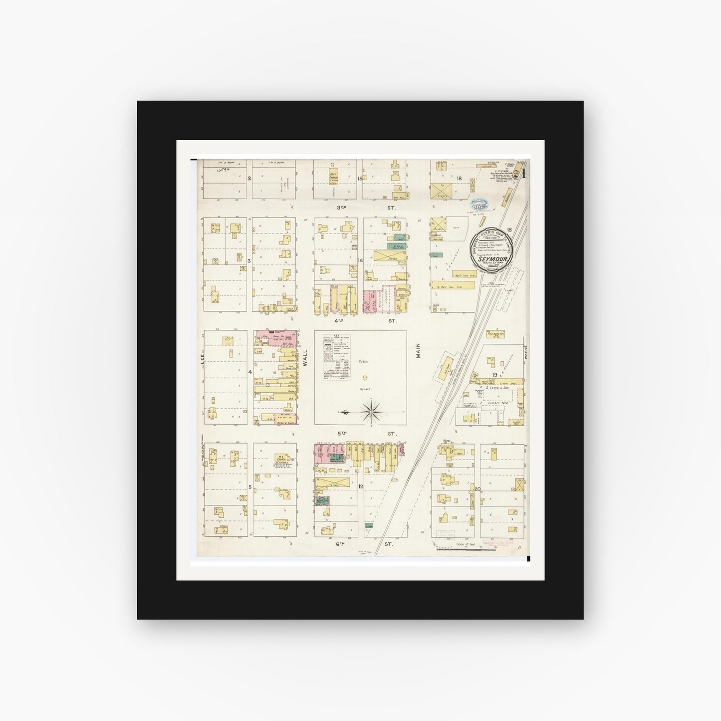 Old map wall art mockup — black gallery frame with white mat — Sanborn Fire Insurance Map from Seymour, Wayne County, Iowa (1894) â€” Complete Set