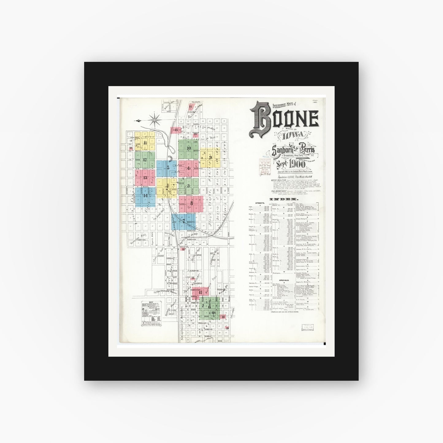 Old map wall art mockup — black gallery frame with white mat — Sanborn Fire Insurance Map from Boone, Boone County, Iowa (1900) â€” Complete Set