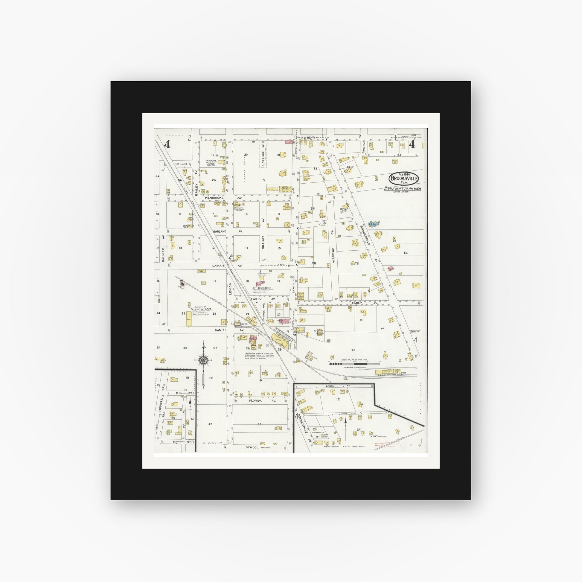 Old map wall art mockup — black gallery frame with white mat — Sanborn Fire Insurance Map from Brooksville, Hernando County, Florida (1924), Sheet #0004