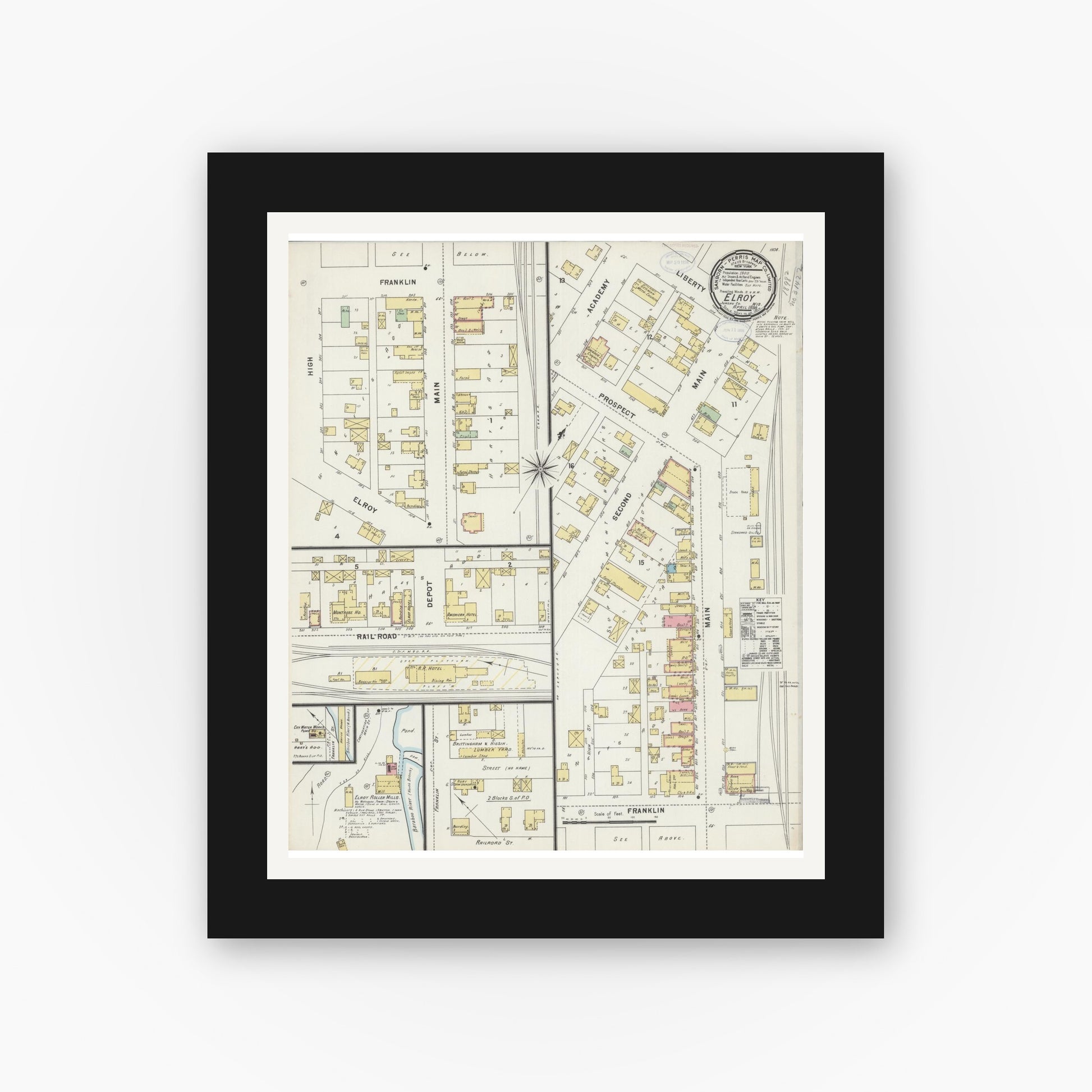 Old map wall art mockup — black gallery frame with white mat — Sanborn Fire Insurance Map from Elroy, Juneau County, Wisconsin (1898), Sheet #0001