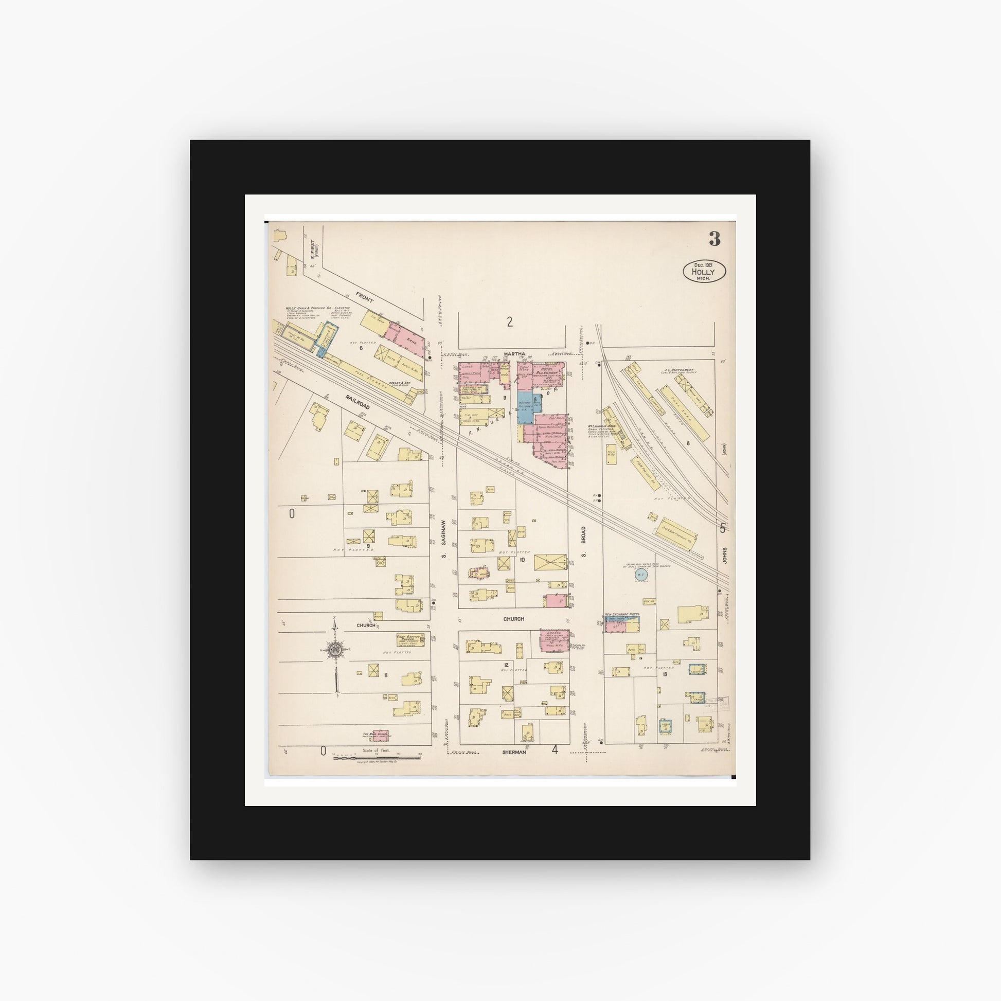 Old map wall art mockup — black gallery frame with white mat — Sanborn Fire Insurance Map from Holly, Oakland County, Michigan (1921), Sheet #0003