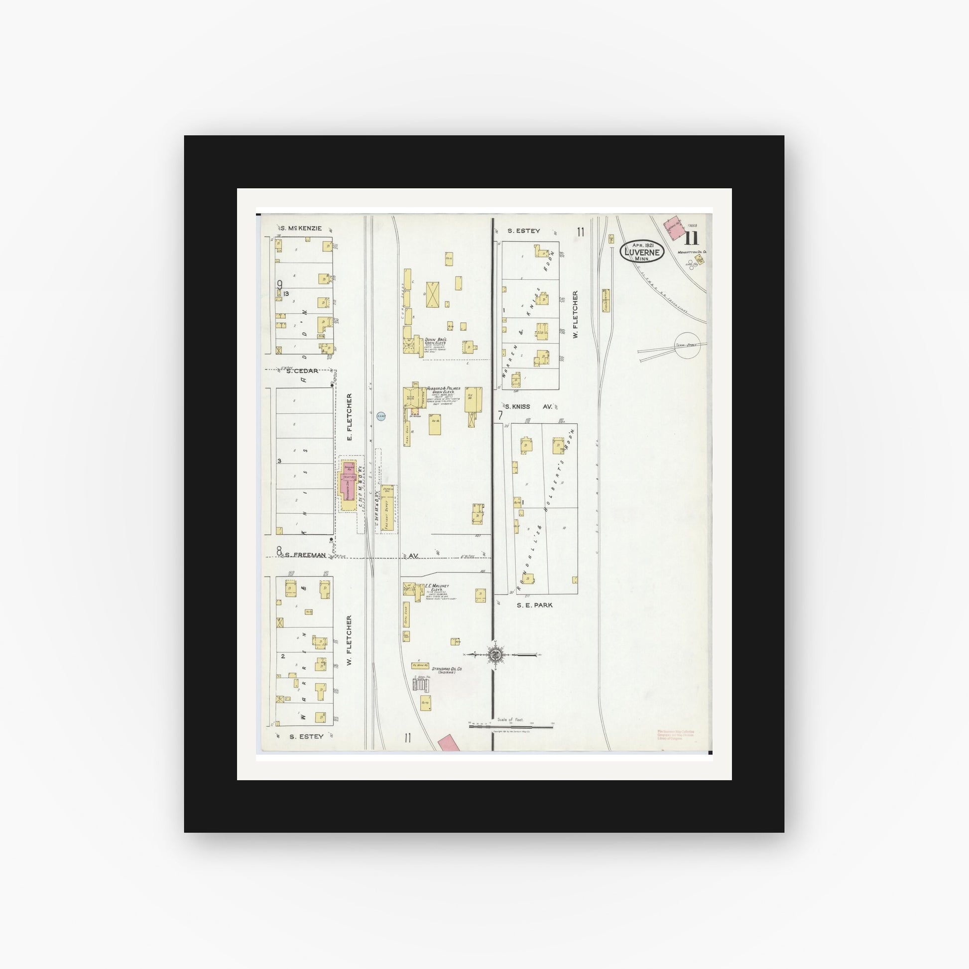 Old map wall art mockup — black gallery frame with white mat — Sanborn Fire Insurance Map from Luverne, Rock County, Minnesota (1921), Sheet #0011