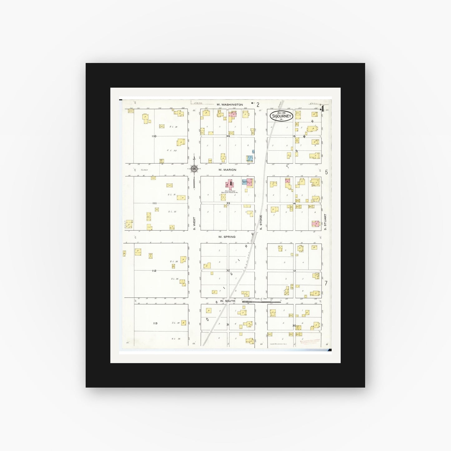 Old map wall art mockup — black gallery frame with white mat — Sanborn Fire Insurance Map from Sigourney, Kiokuk County, Iowa (1916), Sheet #0004