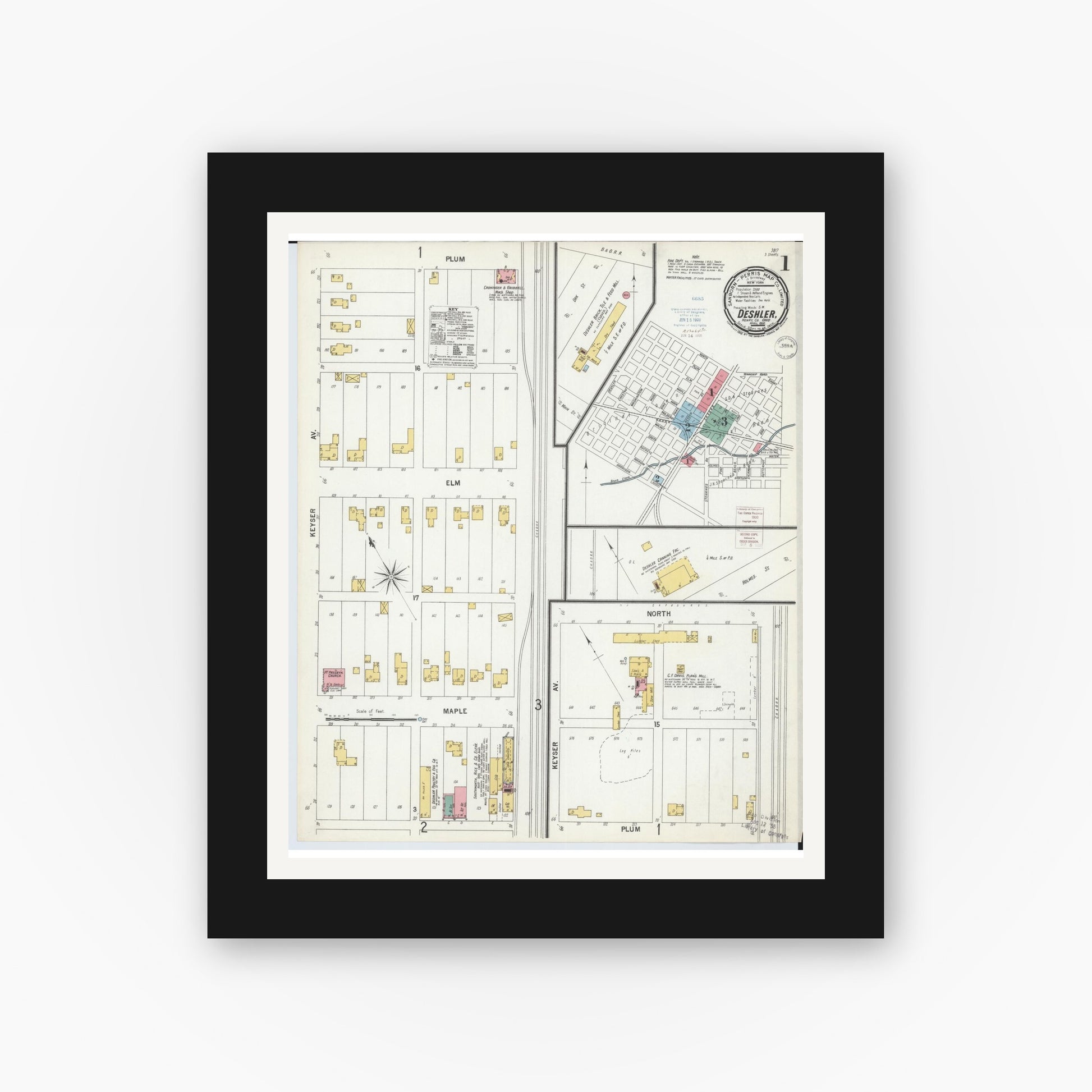 Old map wall art mockup — black gallery frame with white mat — Sanborn Fire Insurance Map from Deshler, Henry County, Ohio (1900), Sheet #0001