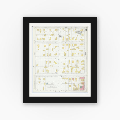 Old map wall art mockup — black gallery frame with white mat — Sanborn Fire Insurance Map from Clare, Clare County, Michigan (1906), Sheet #0002