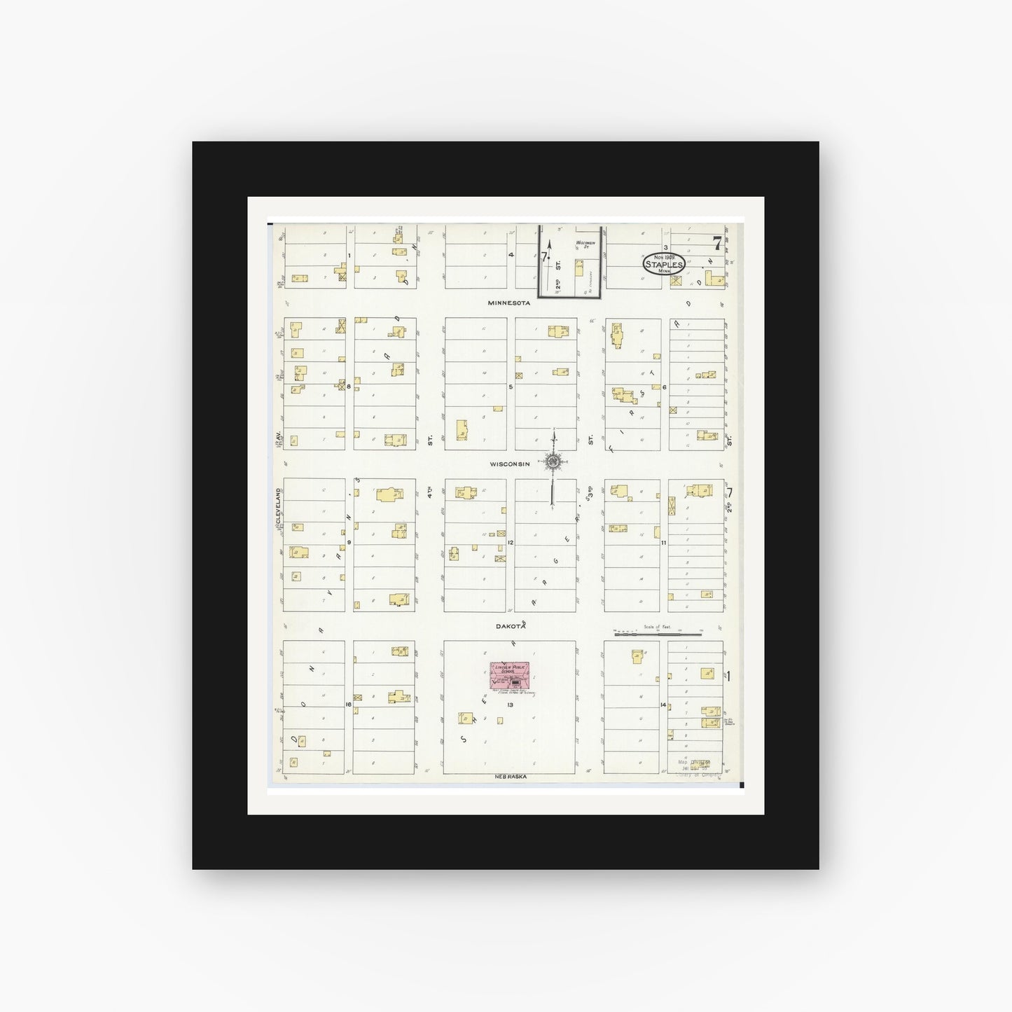Old map wall art mockup — black gallery frame with white mat — Sanborn Fire Insurance Map from Staples, Todd County, Minnesota (1909), Sheet #0007