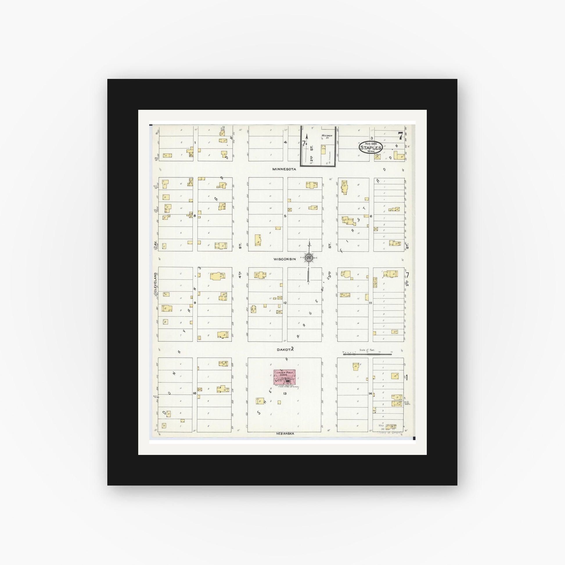 Old map wall art mockup — black gallery frame with white mat — Sanborn Fire Insurance Map from Staples, Todd County, Minnesota (1909), Sheet #0007