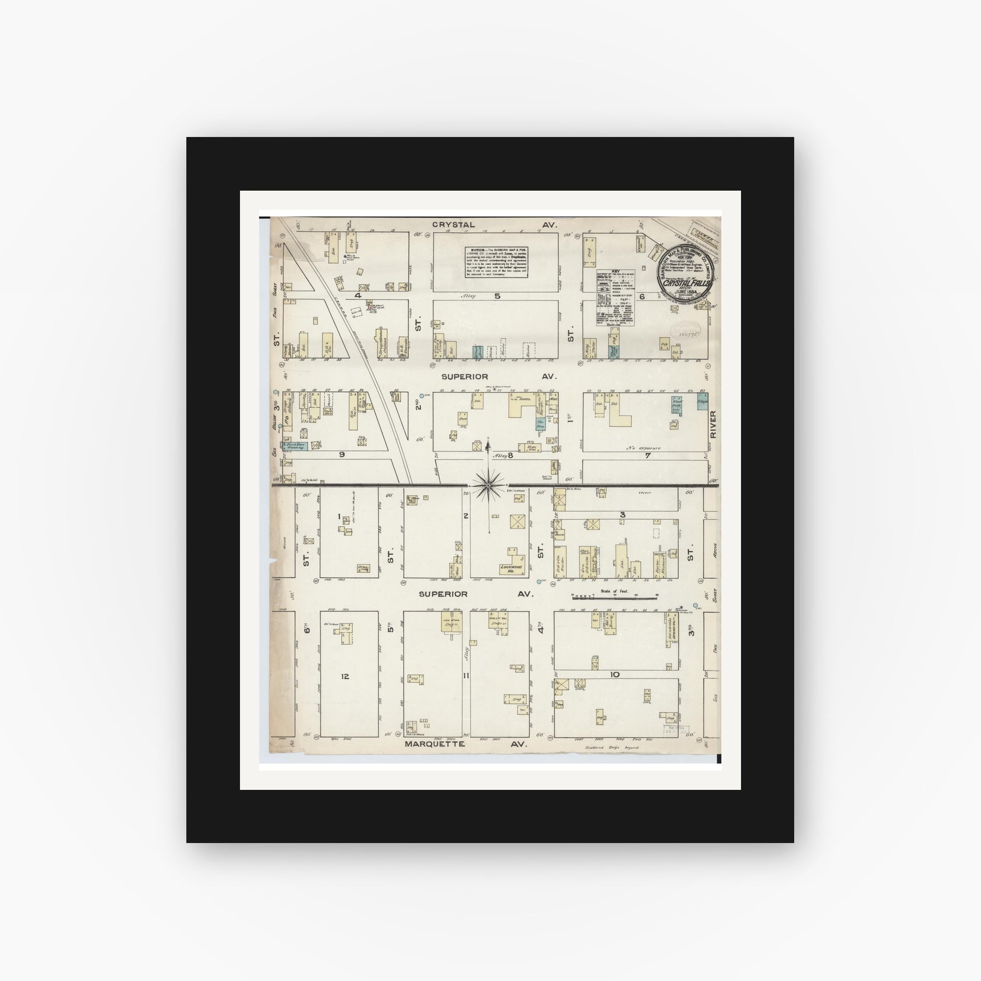 Old map wall art mockup — black gallery frame with white mat — Sanborn Fire Insurance Map from Crystal Falls, Iron County, Michigan (1884), Sheet #0001