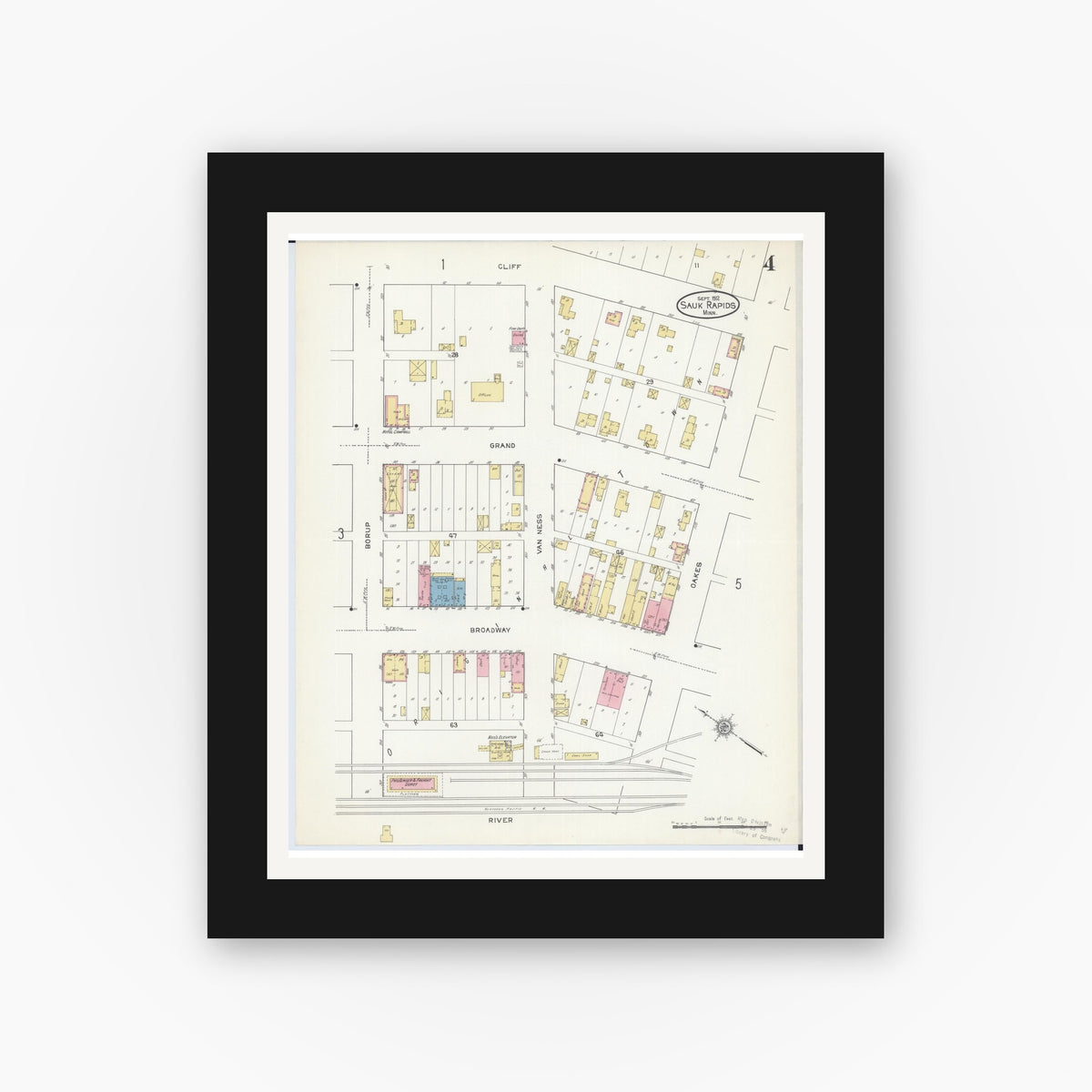 Old map wall art mockup — black gallery frame with white mat — Sanborn Fire Insurance Map from Sauk Rapids, Benton County, Minnesota (1912), Sheet #0004