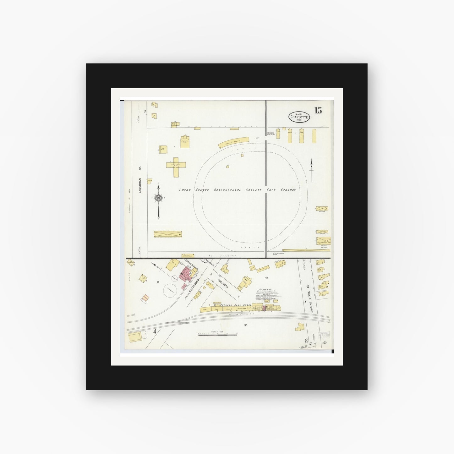 Old map wall art mockup — black gallery frame with white mat — Sanborn Fire Insurance Map from Charlotte, Eaton County, Michigan (1911), Sheet #0015