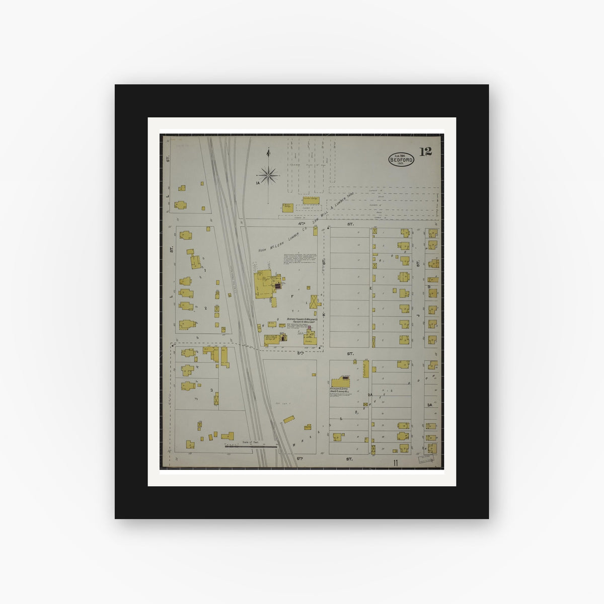 Old map wall art mockup — black gallery frame with white mat — Sanborn Fire Insurance Map from Bedford, Lawrence County, Indiana (1904), Sheet #0012