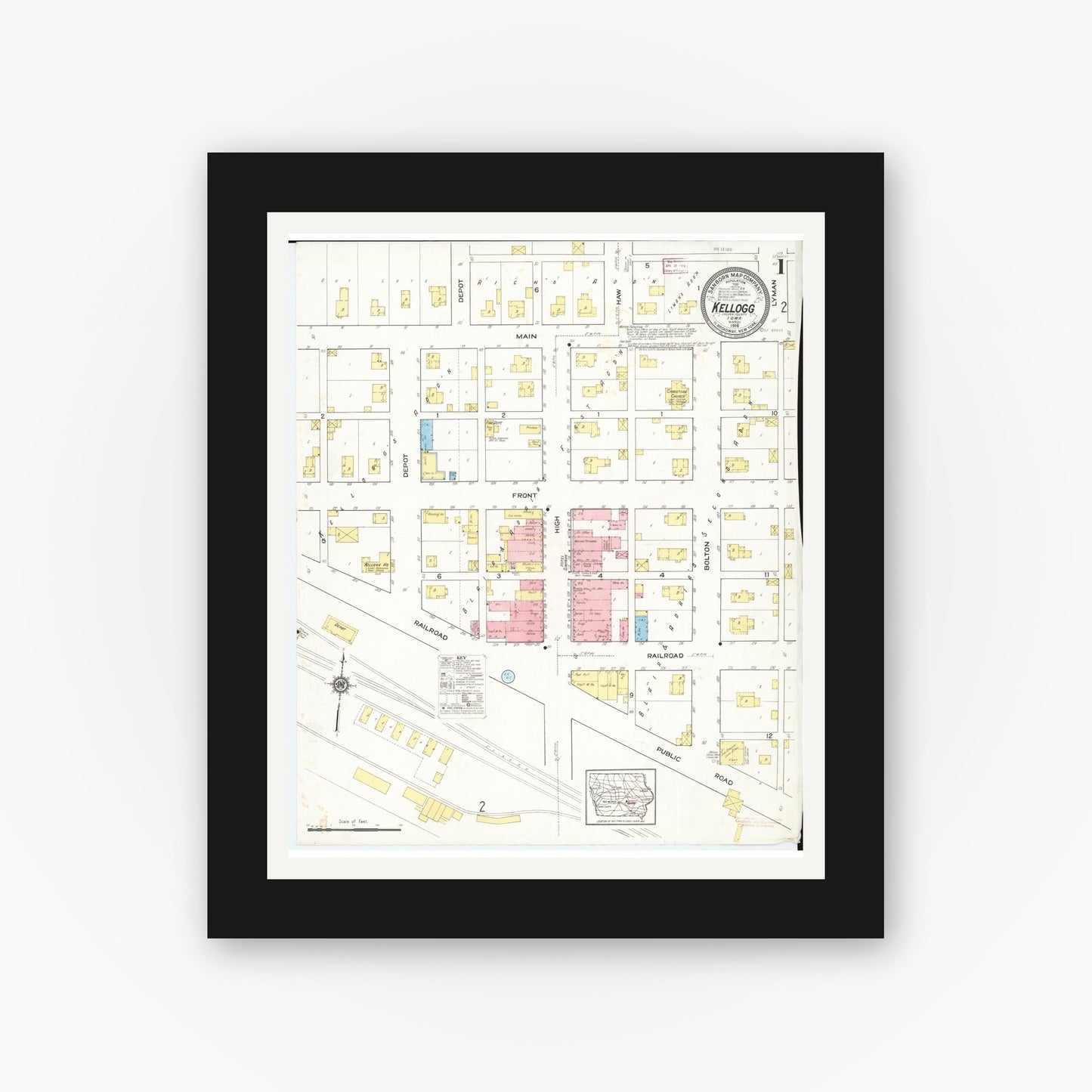 Old map wall art mockup — black gallery frame with white mat — Sanborn Fire Insurance Map from Kellogg, Jasper County, Iowa (1916) â€” Complete Set