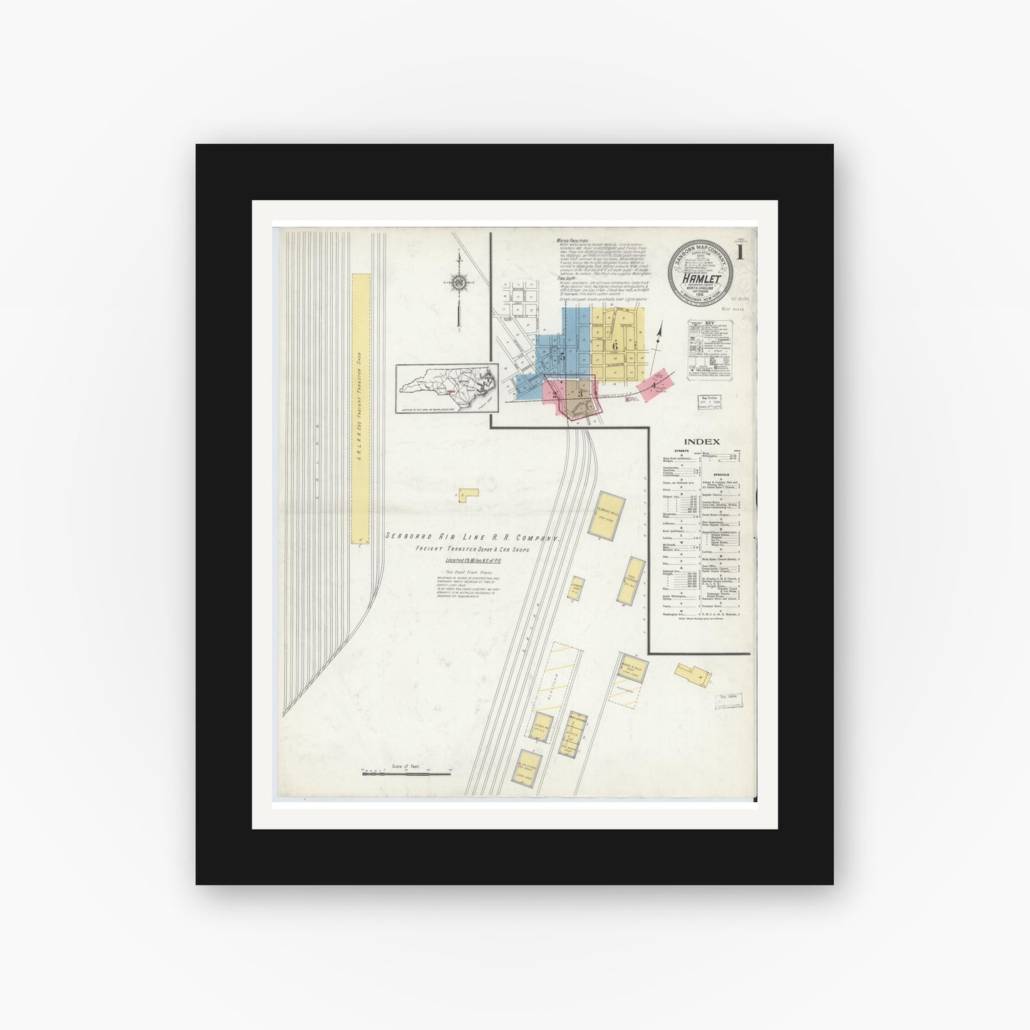 Old map wall art mockup — black gallery frame with white mat — Sanborn Fire Insurance Map from Hamlet, Richmond County, North Carolina (1916), Sheet #0001