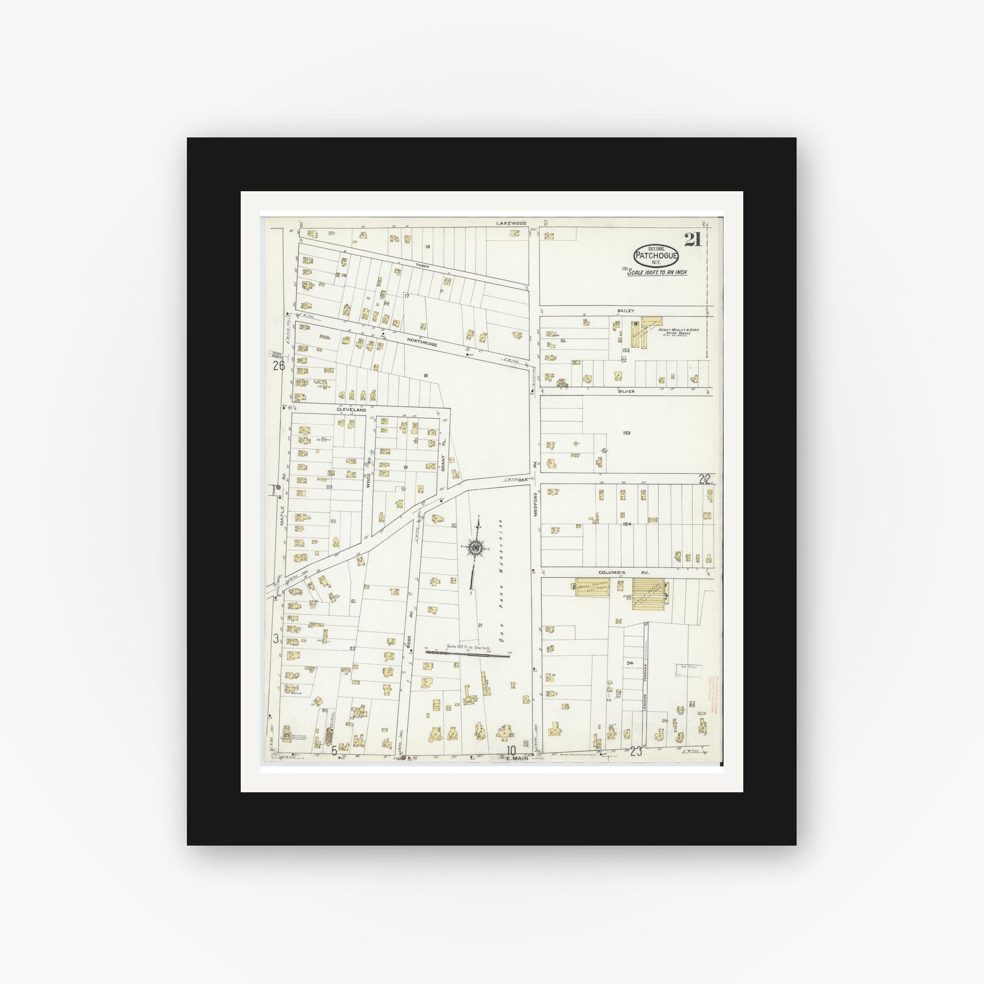 Old map wall art mockup — black gallery frame with white mat — Sanborn Fire Insurance Map from Patchogue, Suffolk County, New York (1916), Sheet #0021