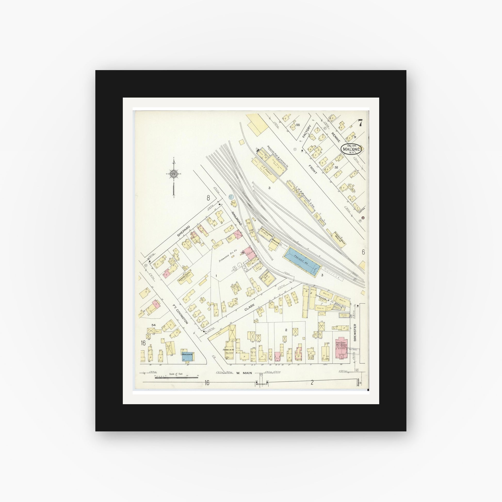 Old map wall art mockup — black gallery frame with white mat — Sanborn Fire Insurance Map from Malone, Franklin County, New York (1914), Sheet #0007