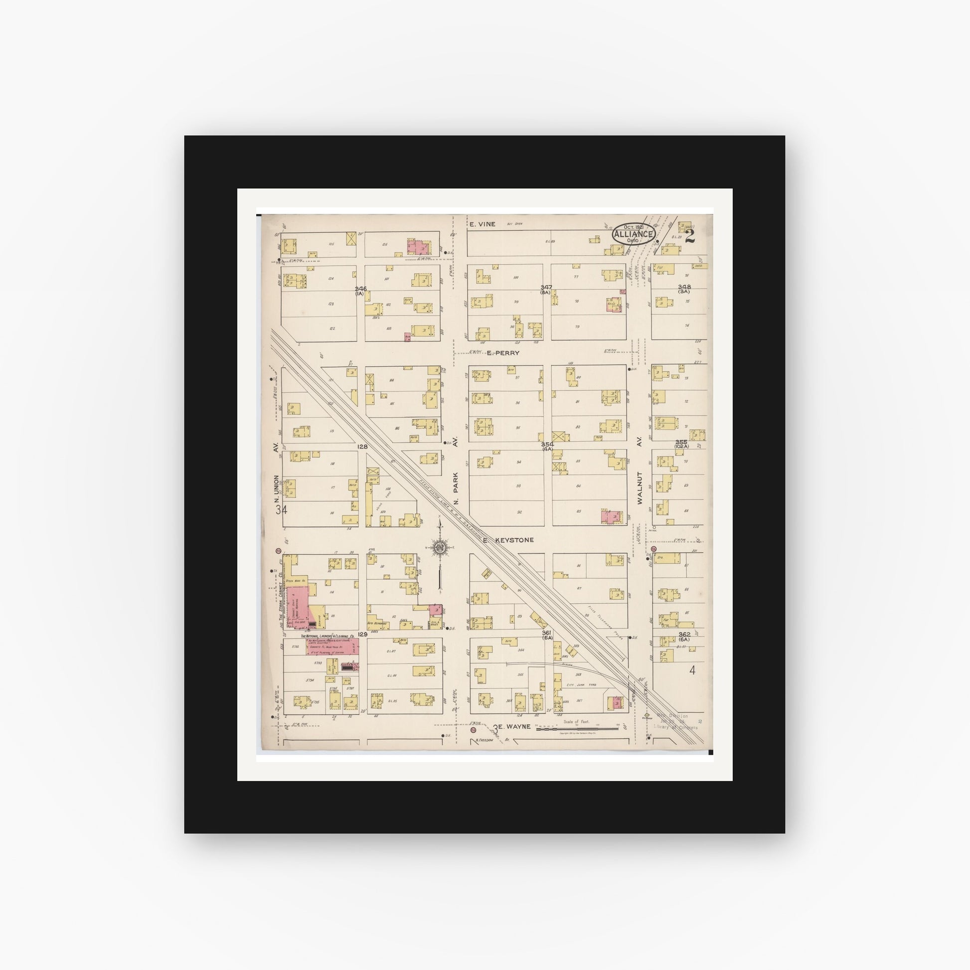 Old map wall art mockup — black gallery frame with white mat — Sanborn Fire Insurance Map from Alliance, Stark County, Ohio (1921), Sheet #0002