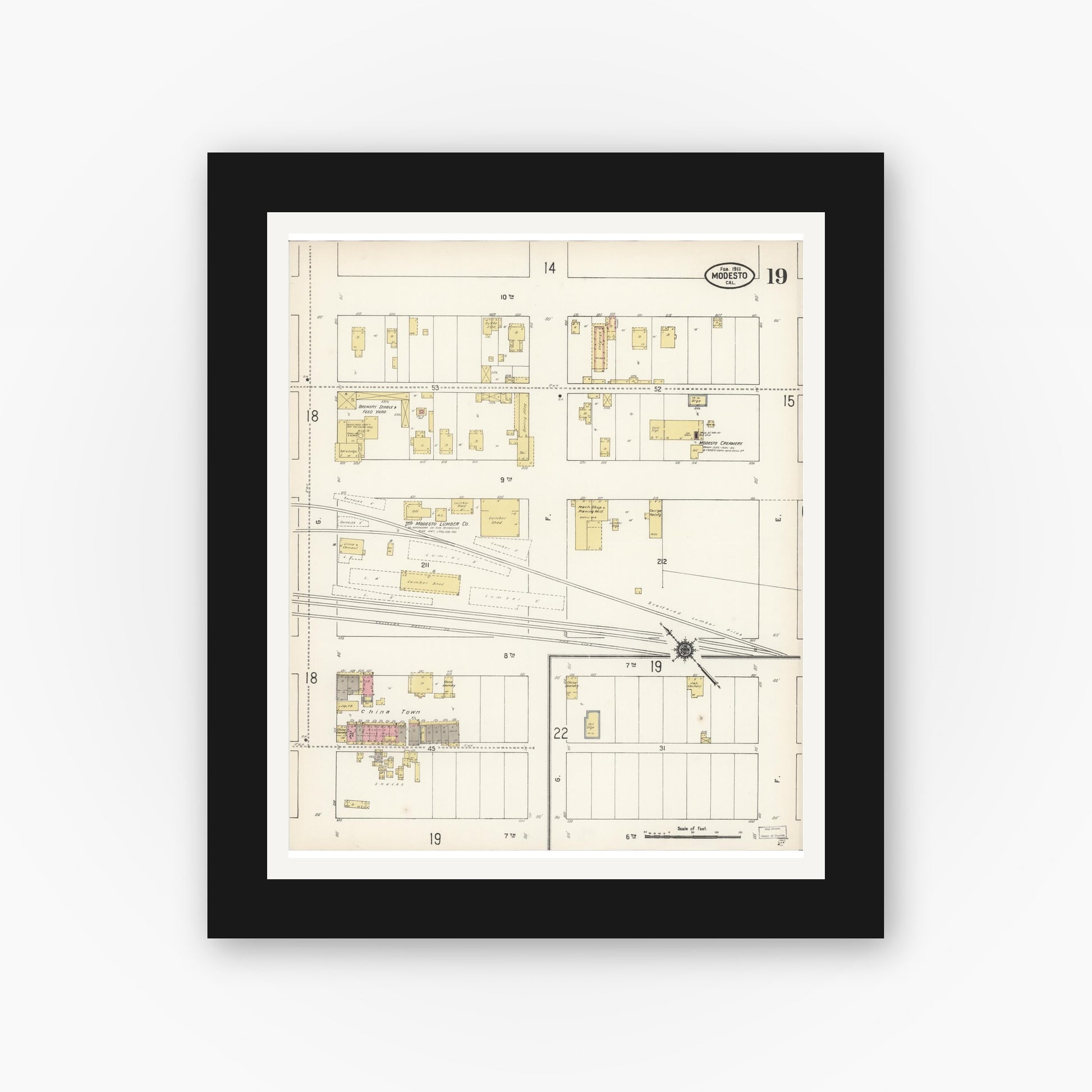Old map wall art mockup — black gallery frame with white mat — Sanborn Fire Insurance Map from Modesto, Stanislaus County, California (1911), Sheet #0019
