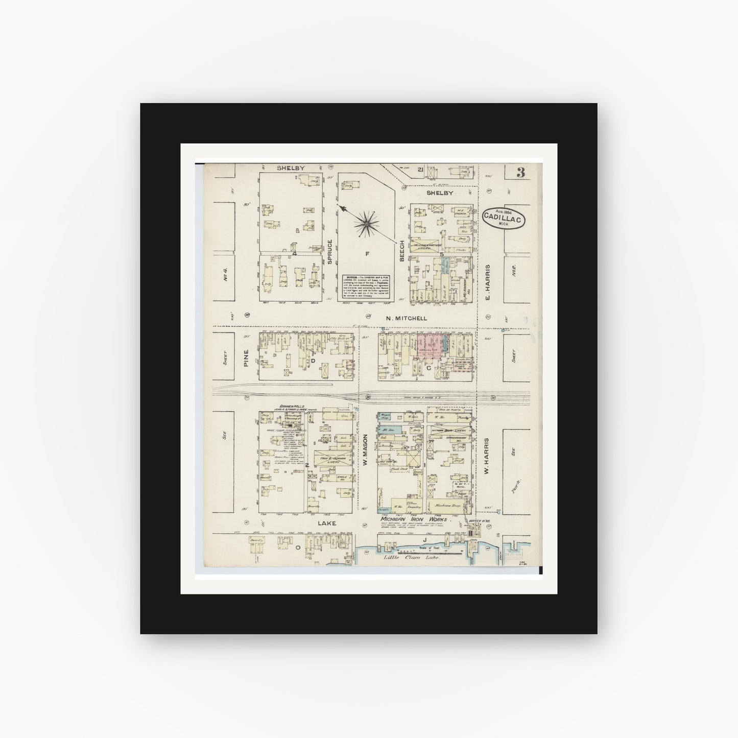 Old map wall art mockup — black gallery frame with white mat — Sanborn Fire Insurance Map from Cadillac, Wexford County, Michigan (1884), Sheet #0003