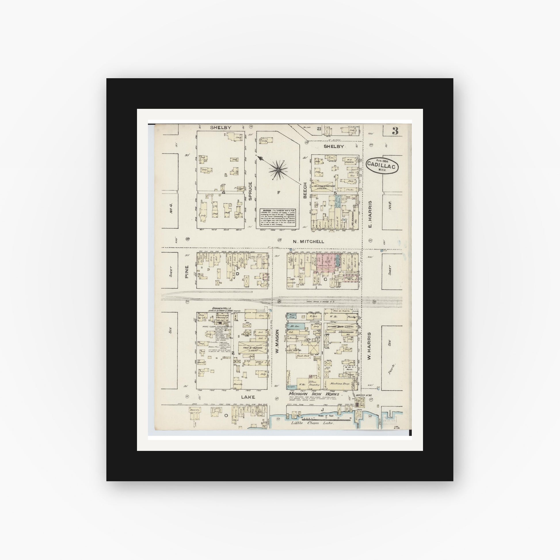 Old map wall art mockup — black gallery frame with white mat — Sanborn Fire Insurance Map from Cadillac, Wexford County, Michigan (1884), Sheet #0003