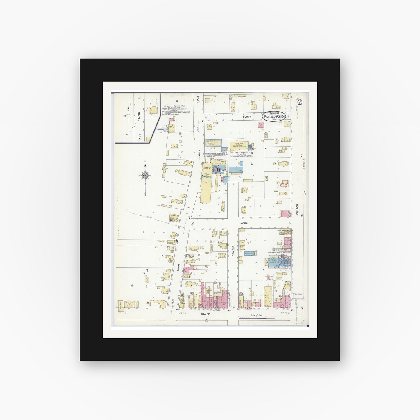 Old map wall art mockup — black gallery frame with white mat — Sanborn Fire Insurance Map from Prairie du Chien, Crawford County, Wisconsin (1912), Sheet #0002