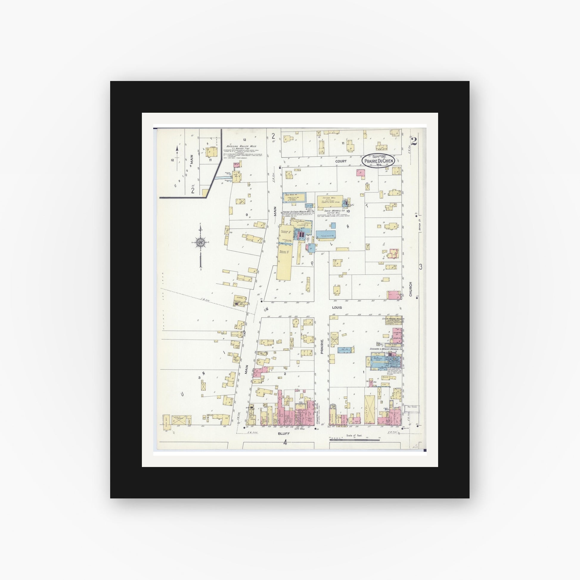 Old map wall art mockup — black gallery frame with white mat — Sanborn Fire Insurance Map from Prairie du Chien, Crawford County, Wisconsin (1912), Sheet #0002