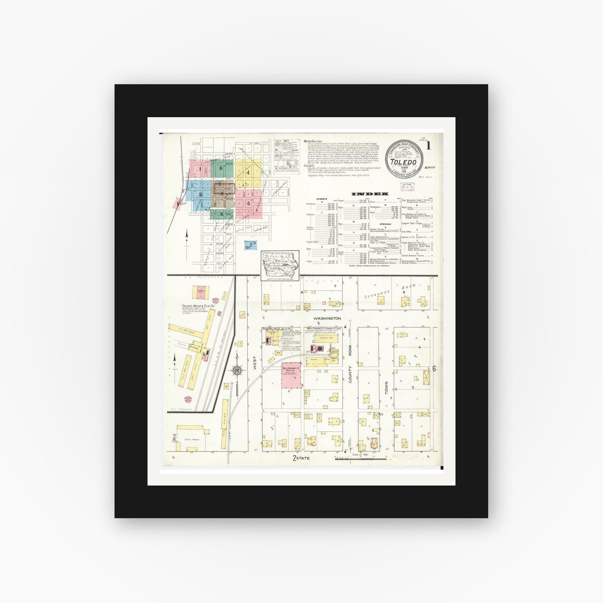 Old map wall art mockup — black gallery frame with white mat — Sanborn Fire Insurance Map from Toledo, Tama County, Iowa (1915), Sheet #0001