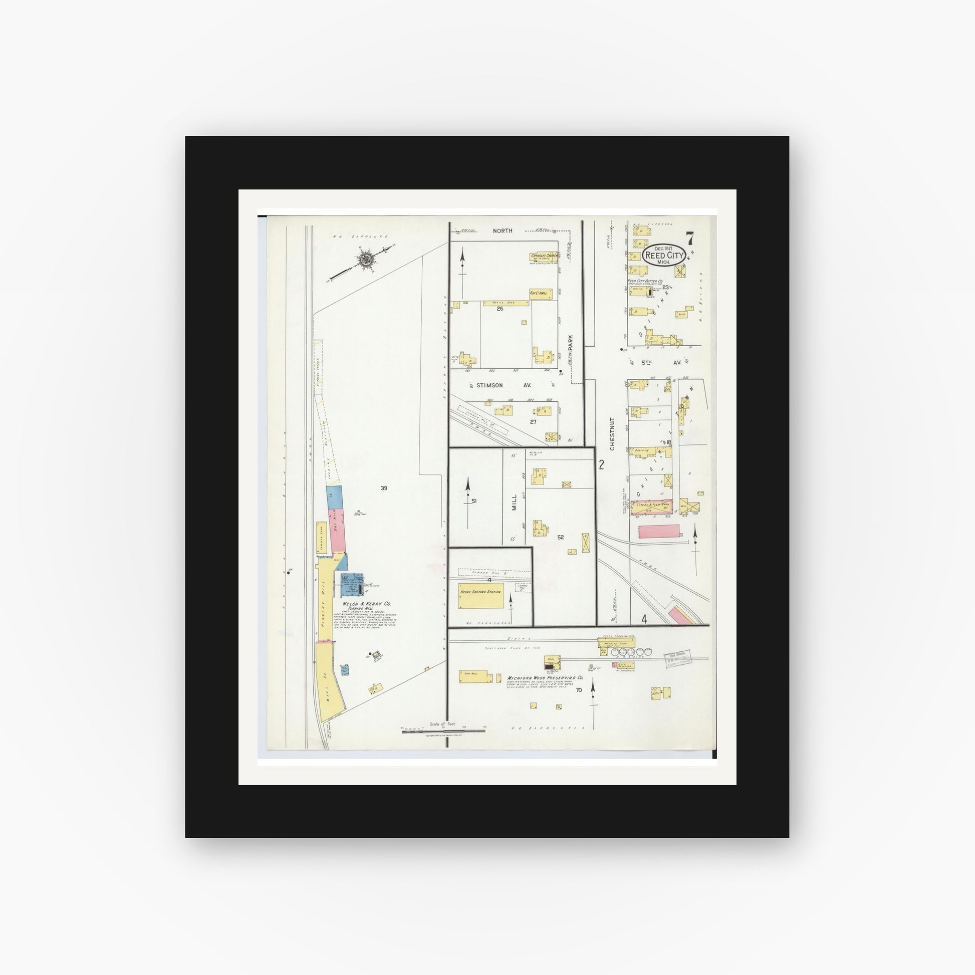 Old map wall art mockup — black gallery frame with white mat — Sanborn Fire Insurance Map from Reed City, Osceola County, Michigan (1917), Sheet #0007