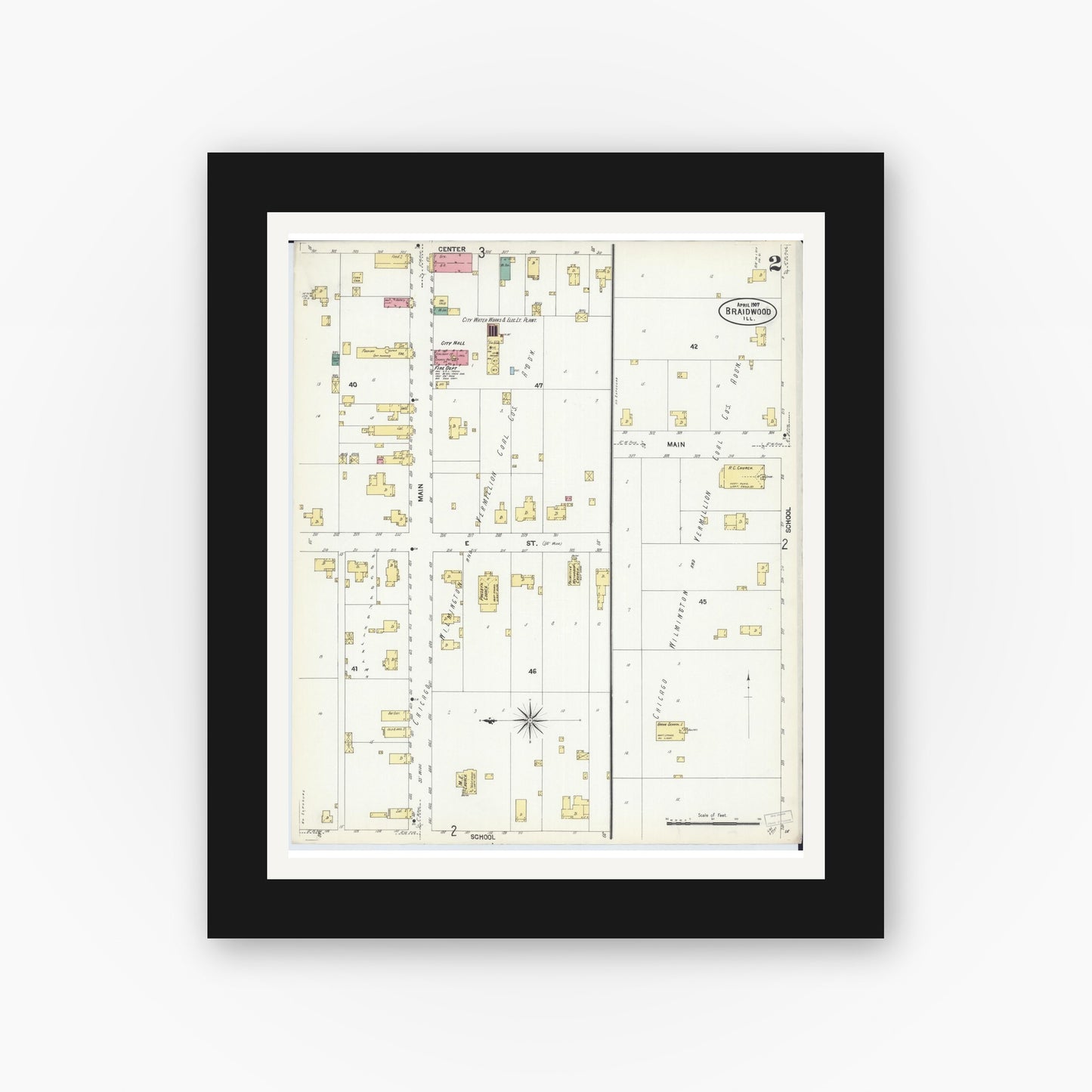 Old map wall art mockup — black gallery frame with white mat — Sanborn Fire Insurance Map from Braidwood, Will County, Illinois (1907), Sheet #0002