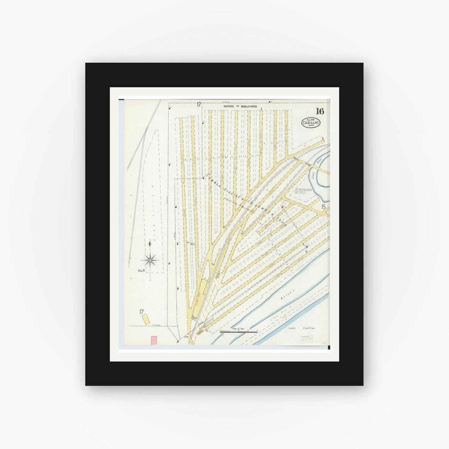 Old map wall art mockup — black gallery frame with white mat — Sanborn Fire Insurance Map from Cadillac, Wexford County, Michigan (1906), Sheet #0016