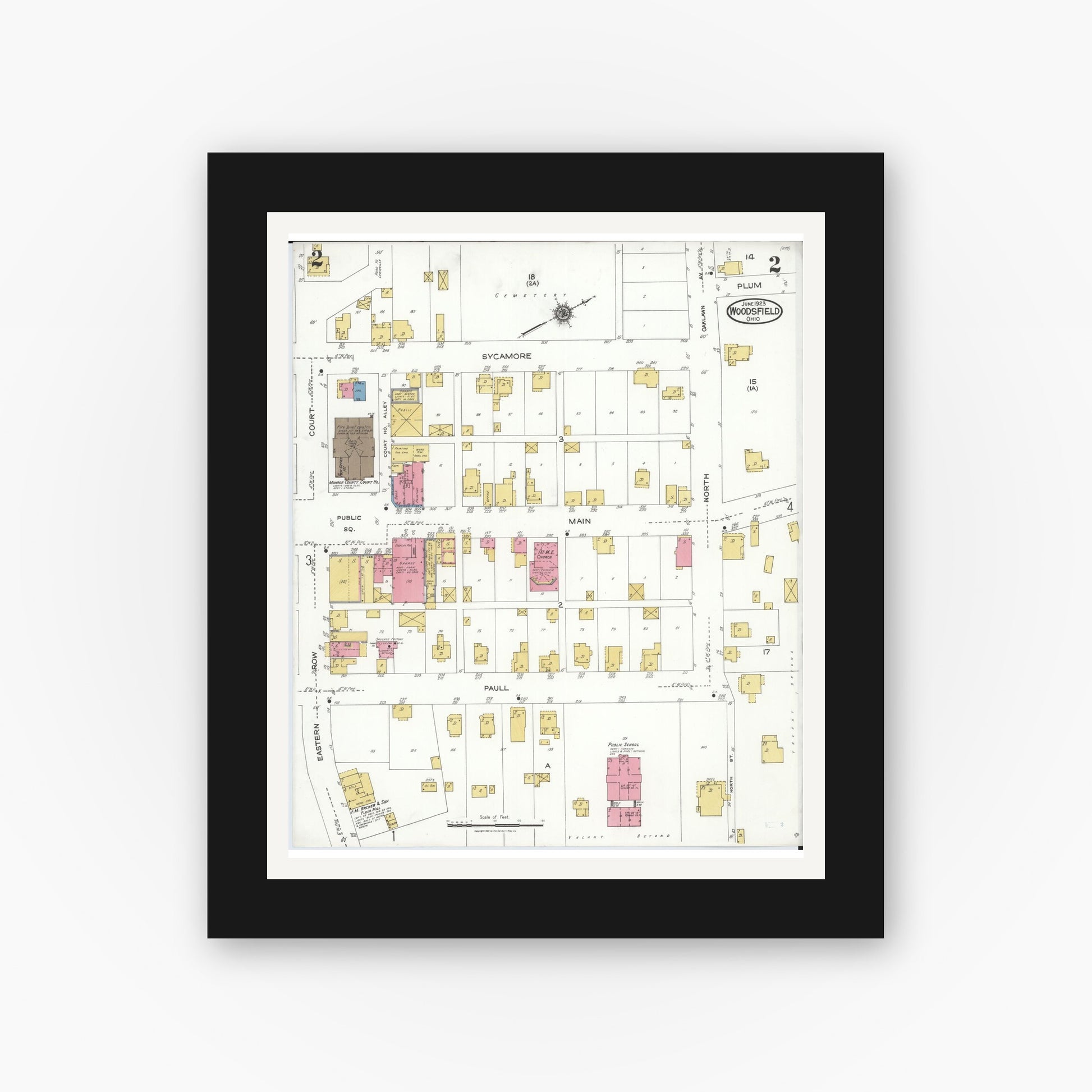 Old map wall art mockup — black gallery frame with white mat — Sanborn Fire Insurance Map from Woodsfield, Monroe County, Ohio (1923), Sheet #0002