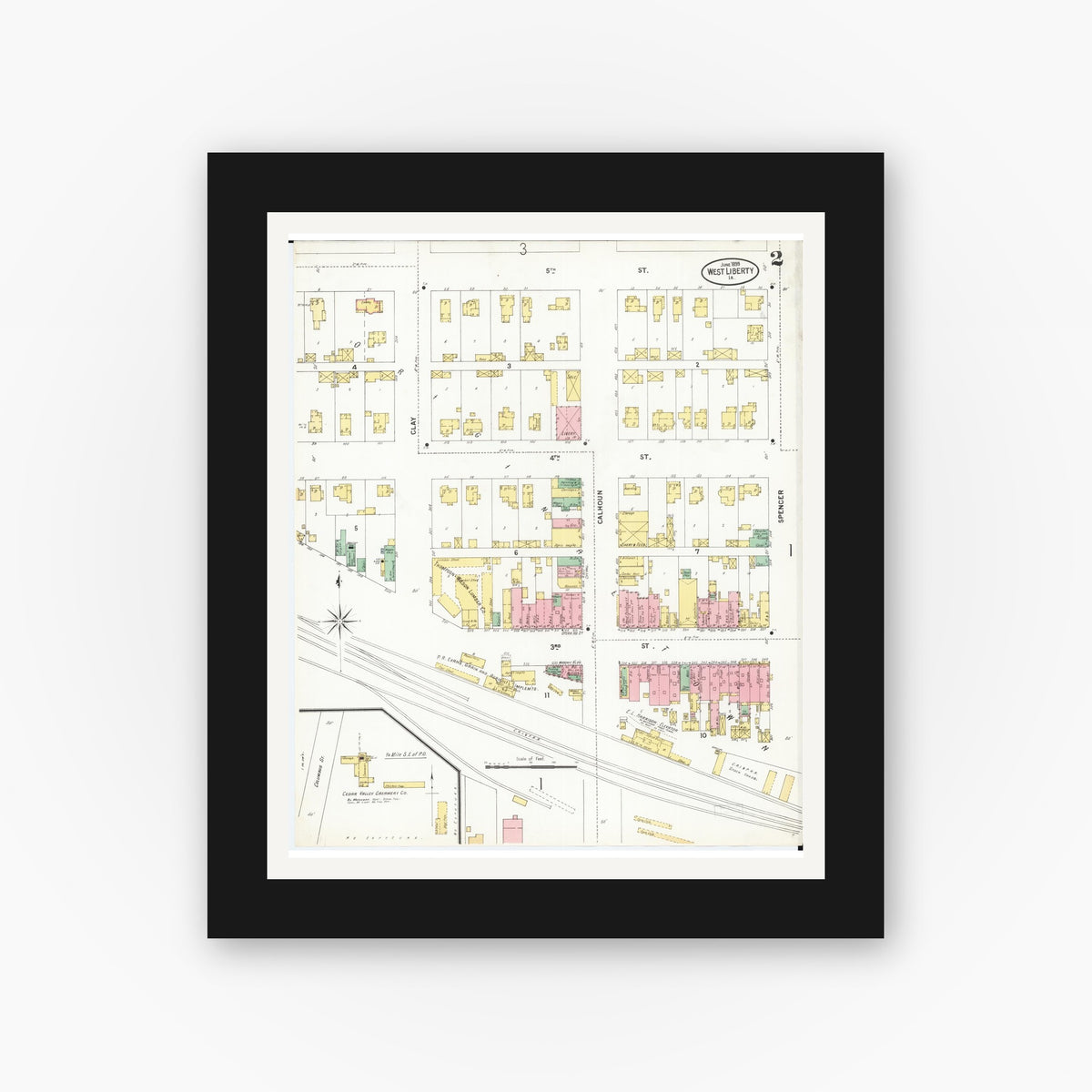 Old map wall art mockup — black gallery frame with white mat — Sanborn Fire Insurance Map from West Liberty, Muscatine County, Iowa (1899), Sheet #0002