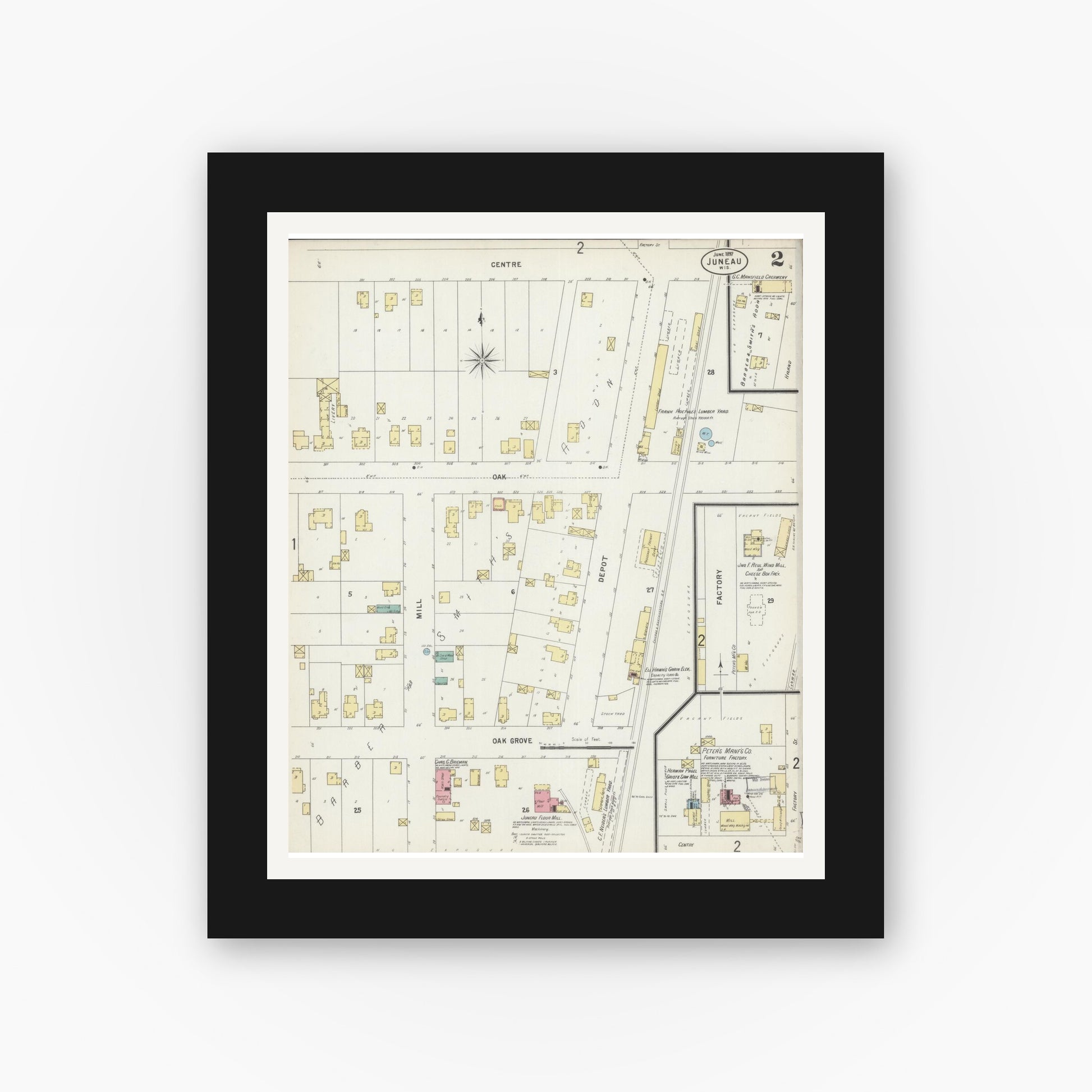 Old map wall art mockup — black gallery frame with white mat — Sanborn Fire Insurance Map from Juneau, Dodge County, Wisconsin (1897), Sheet #0002