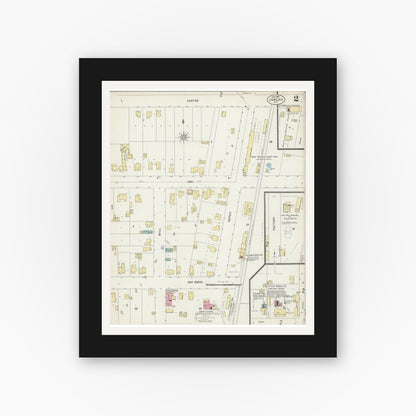 Old map wall art mockup — black gallery frame with white mat — Sanborn Fire Insurance Map from Juneau, Dodge County, Wisconsin (1897), Sheet #0002