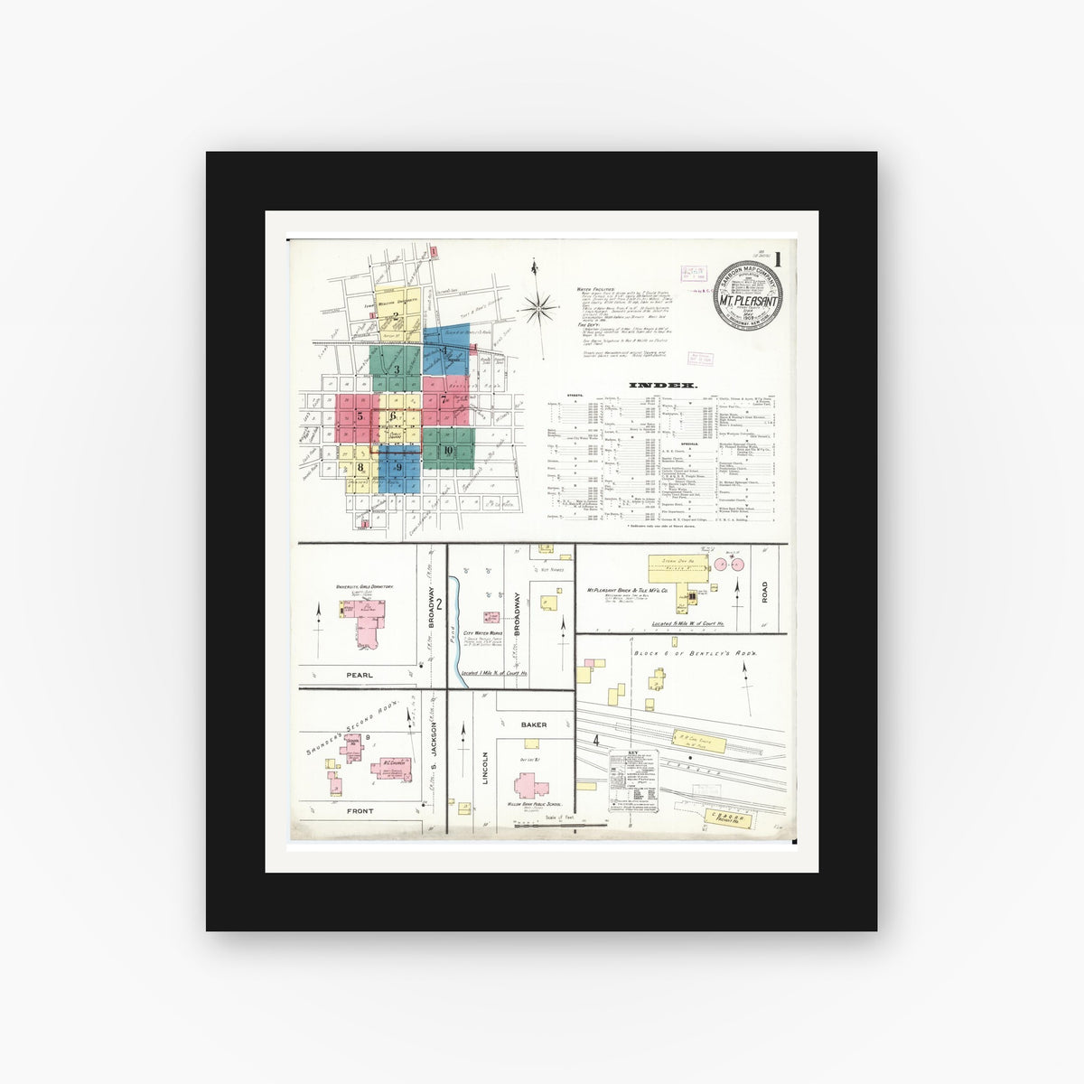 Old map wall art mockup — black gallery frame with white mat — Sanborn Fire Insurance Map from Mount Pleasant, Henry County, Iowa (1909) â€” Complete Set