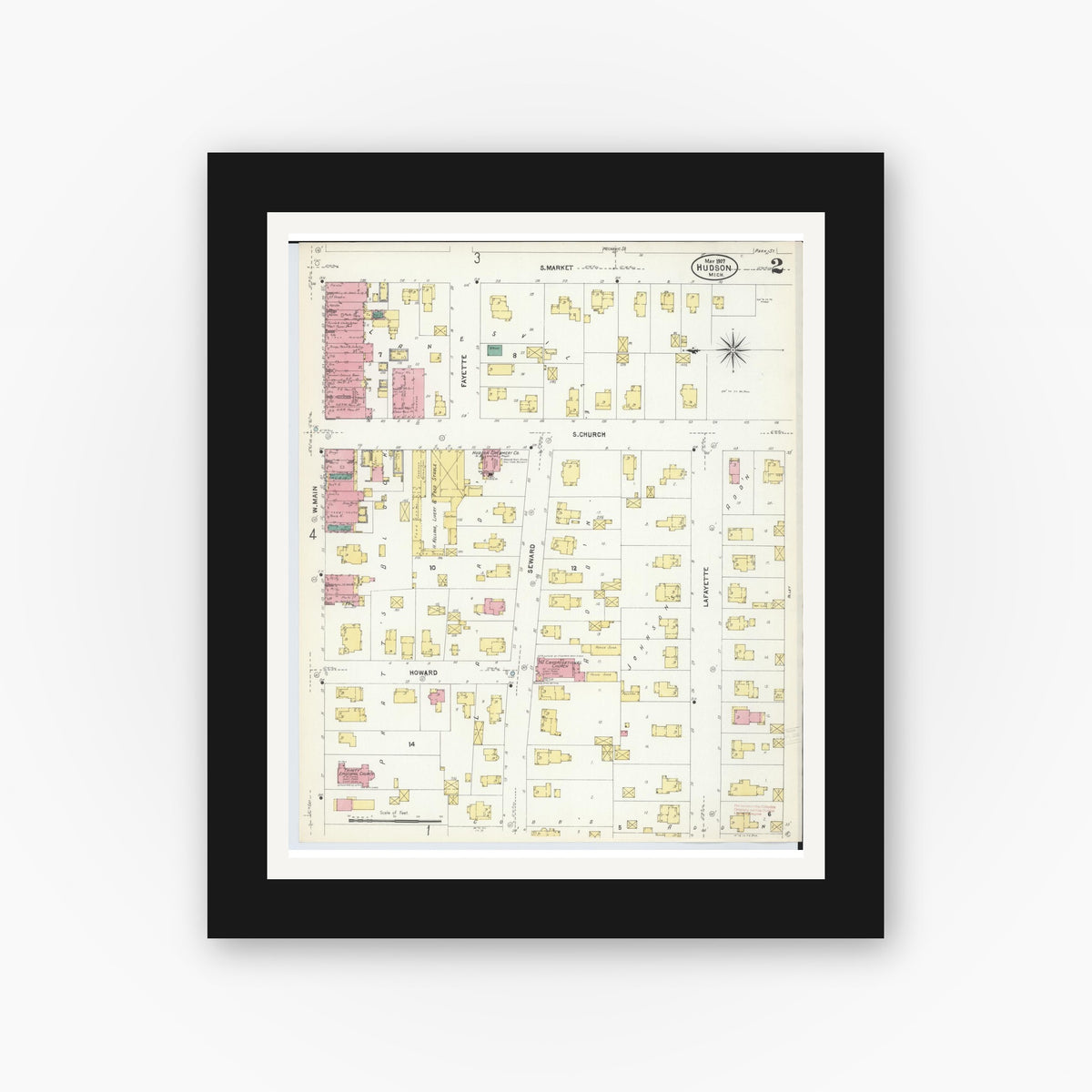 Old map wall art mockup — black gallery frame with white mat — Sanborn Fire Insurance Map from Hudson, Lenawee County, Michigan (1907), Sheet #0002
