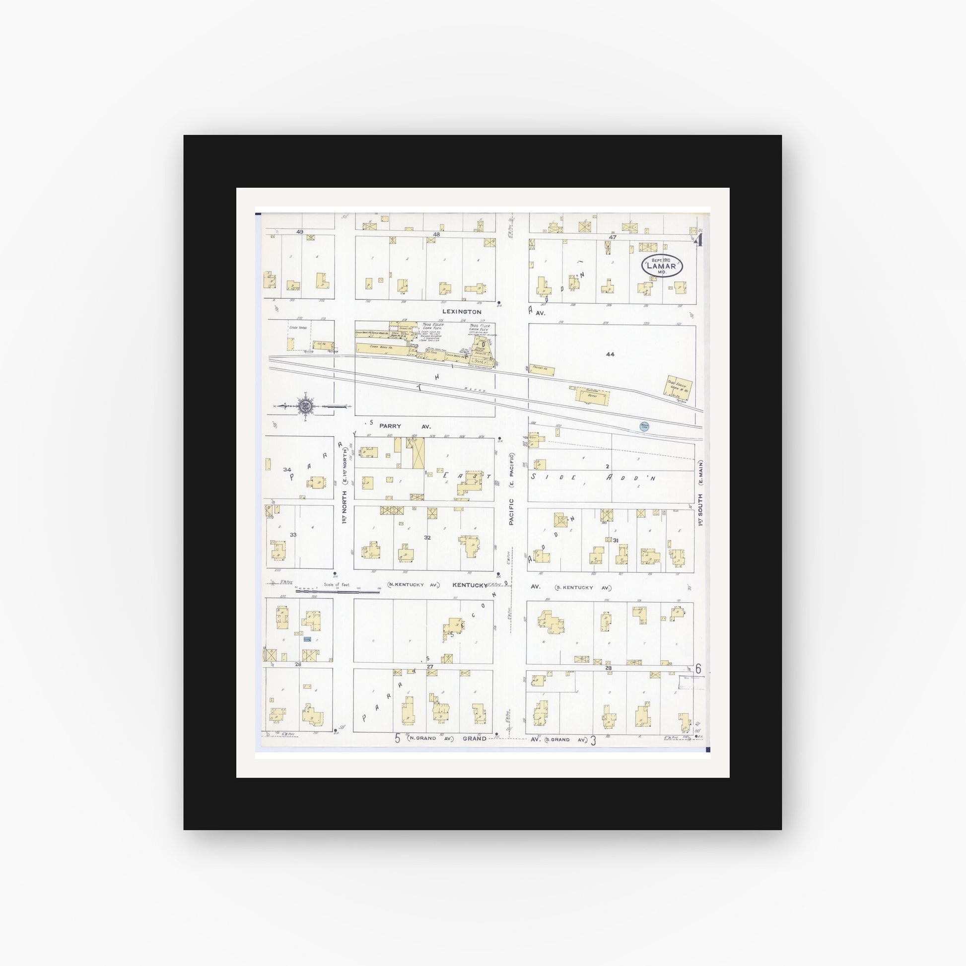 Old map wall art mockup — black gallery frame with white mat — Sanborn Fire Insurance Map from Lamar, Barton County, Missouri (1910), Sheet #0004