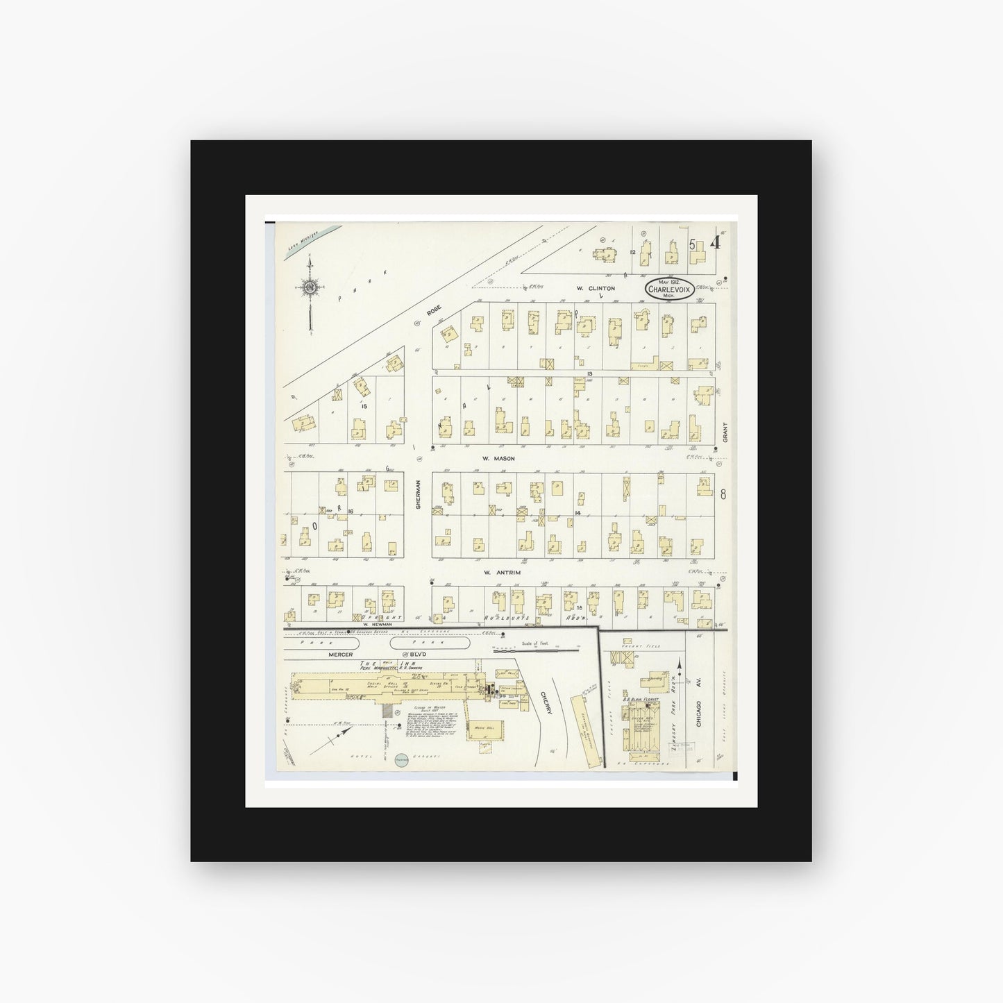 Old map wall art mockup — black gallery frame with white mat — Sanborn Fire Insurance Map from Charlevoix, Charlevoix County, Michigan (1912), Sheet #0004