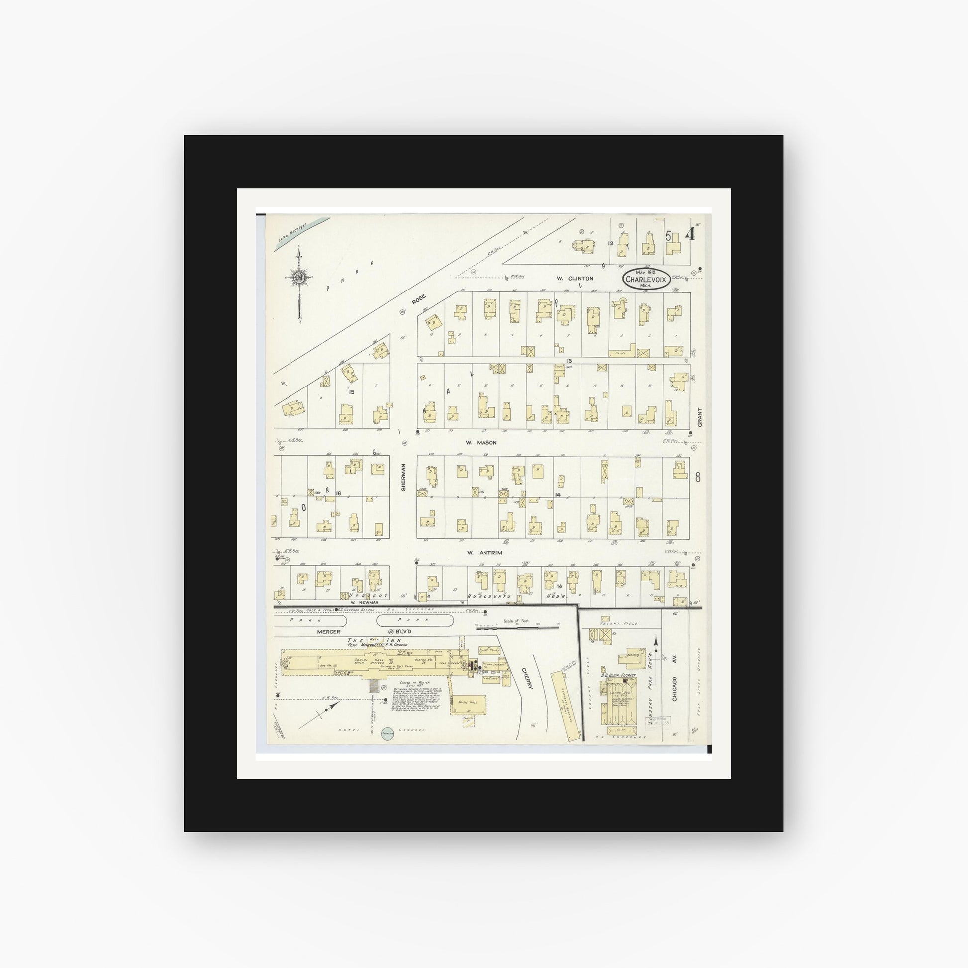 Old map wall art mockup — black gallery frame with white mat — Sanborn Fire Insurance Map from Charlevoix, Charlevoix County, Michigan (1912), Sheet #0004