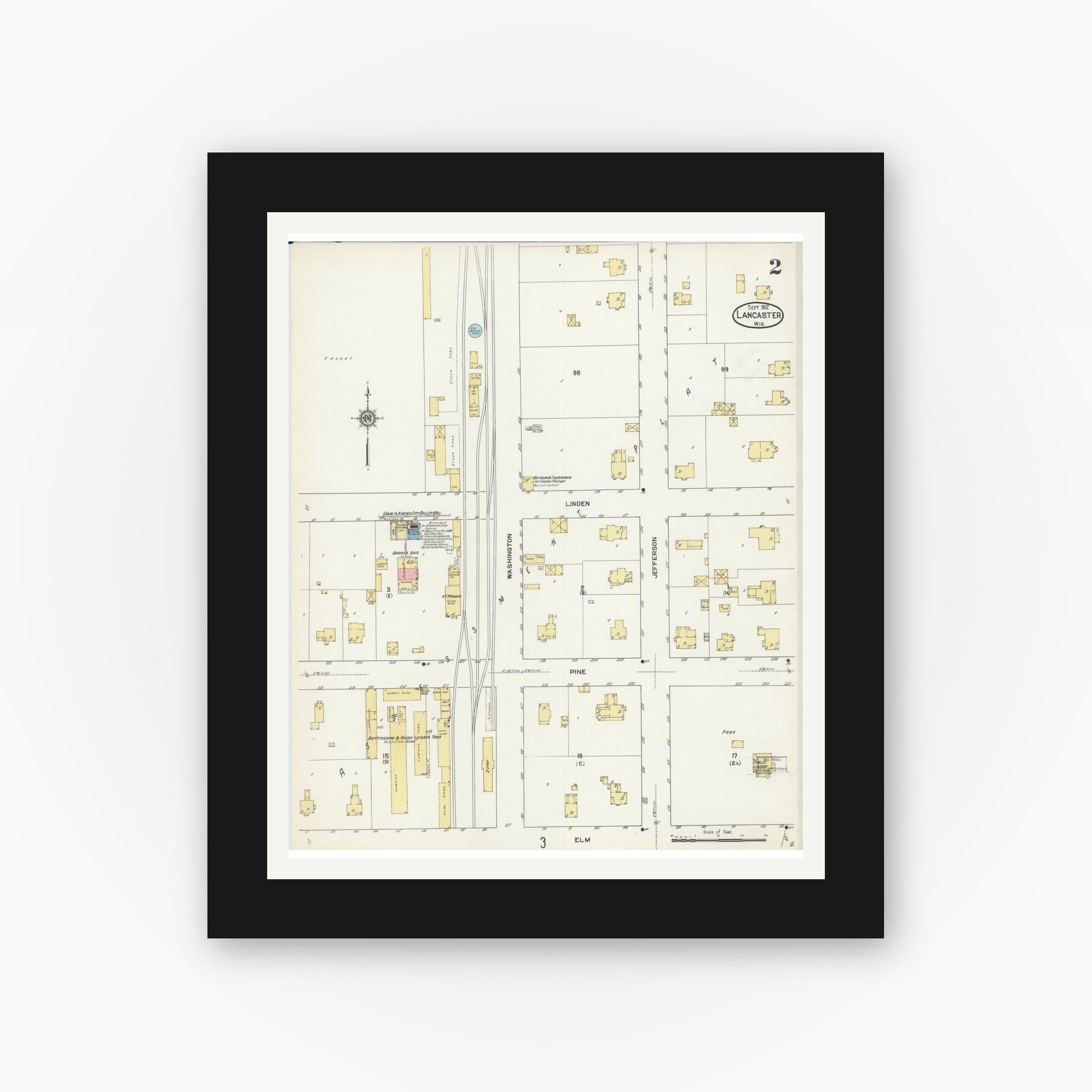 Old map wall art mockup — black gallery frame with white mat — Sanborn Fire Insurance Map from Lancaster, Grant County, Wisconsin (1912), Sheet #0002