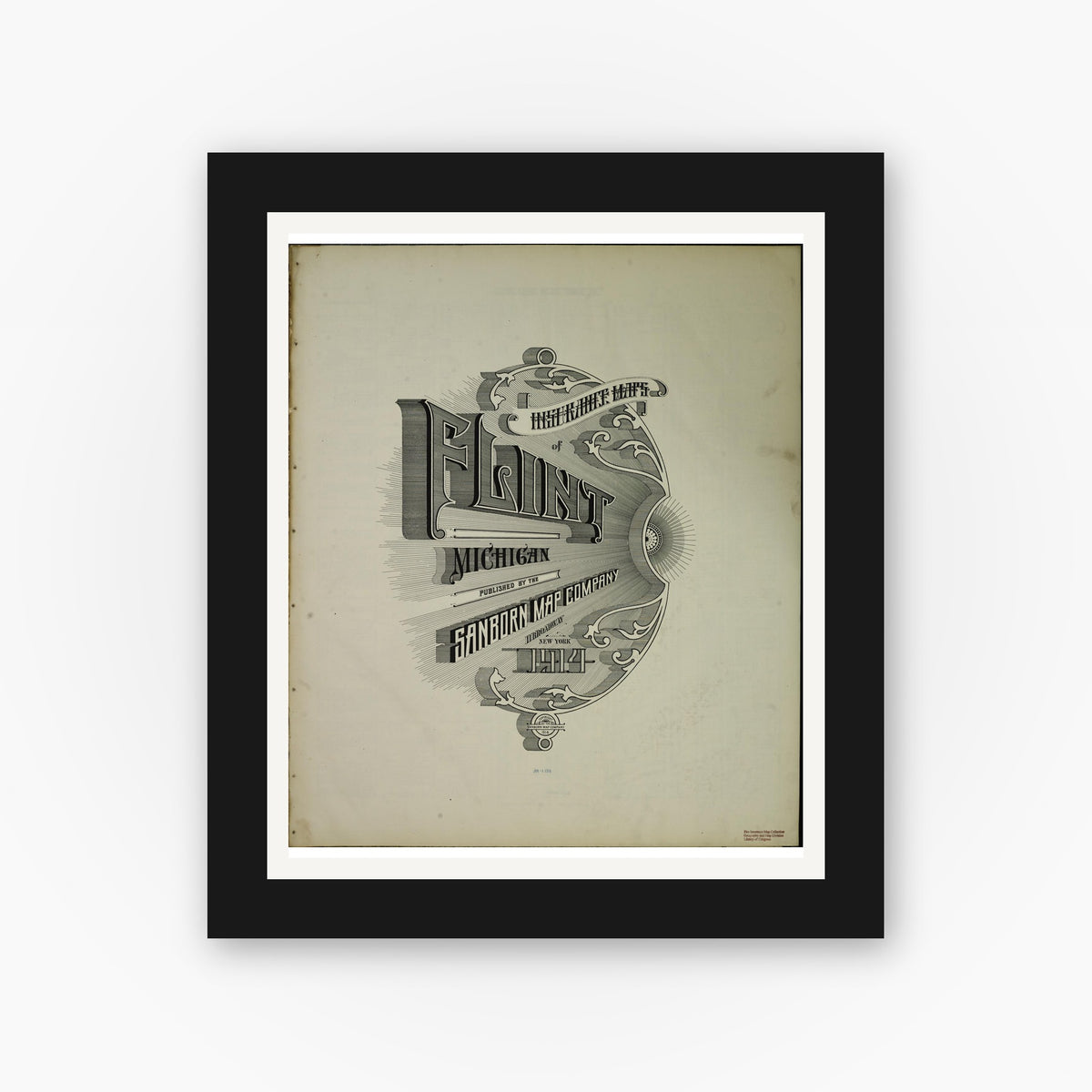 Old map wall art mockup — black gallery frame with white mat — Sanborn Fire Insurance Map from Flint, Genesee County, Michigan (1914), Sheet #0001