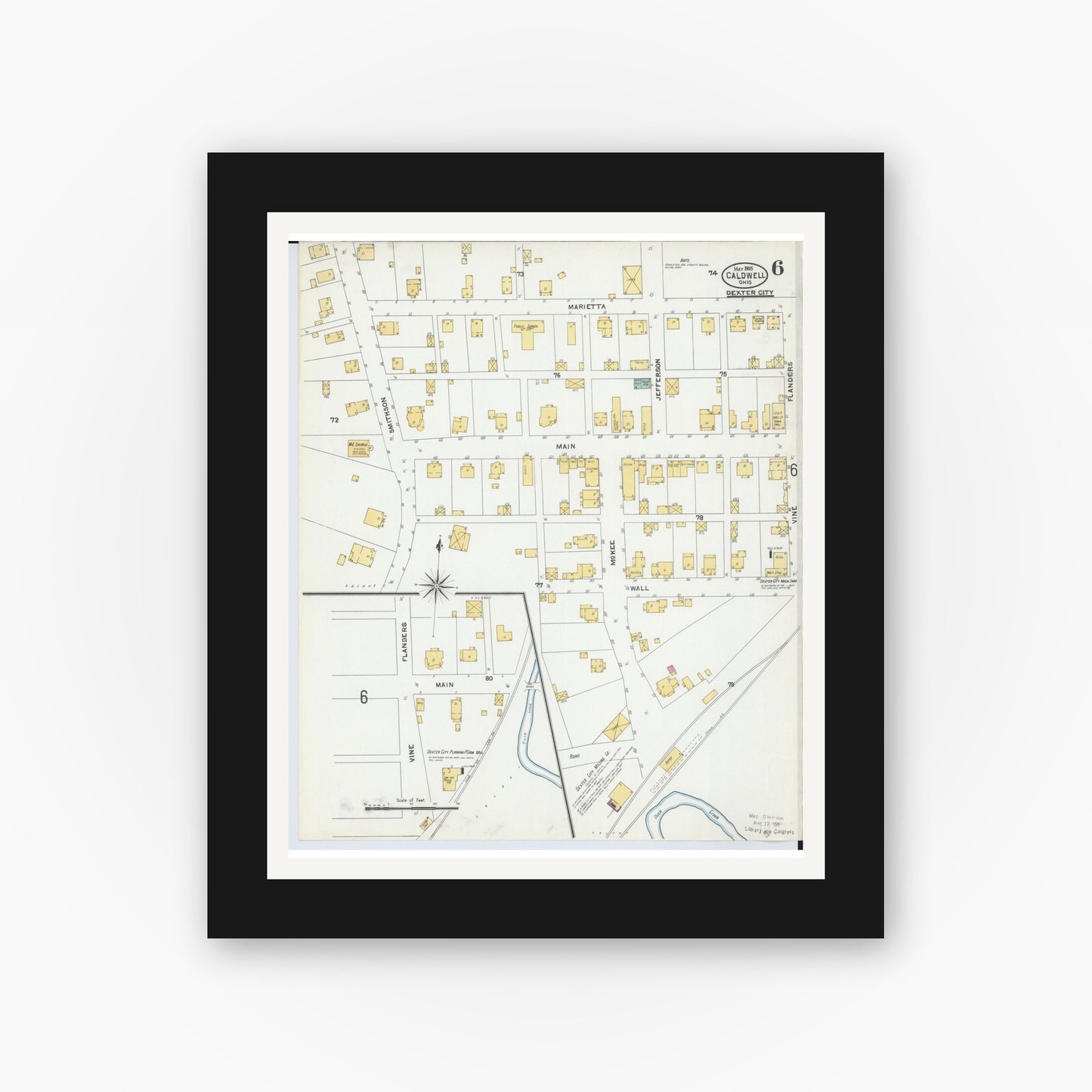 Old map wall art mockup — black gallery frame with white mat — Sanborn Fire Insurance Map from Caldwell, Noble County, Ohio (1905), Sheet #0006