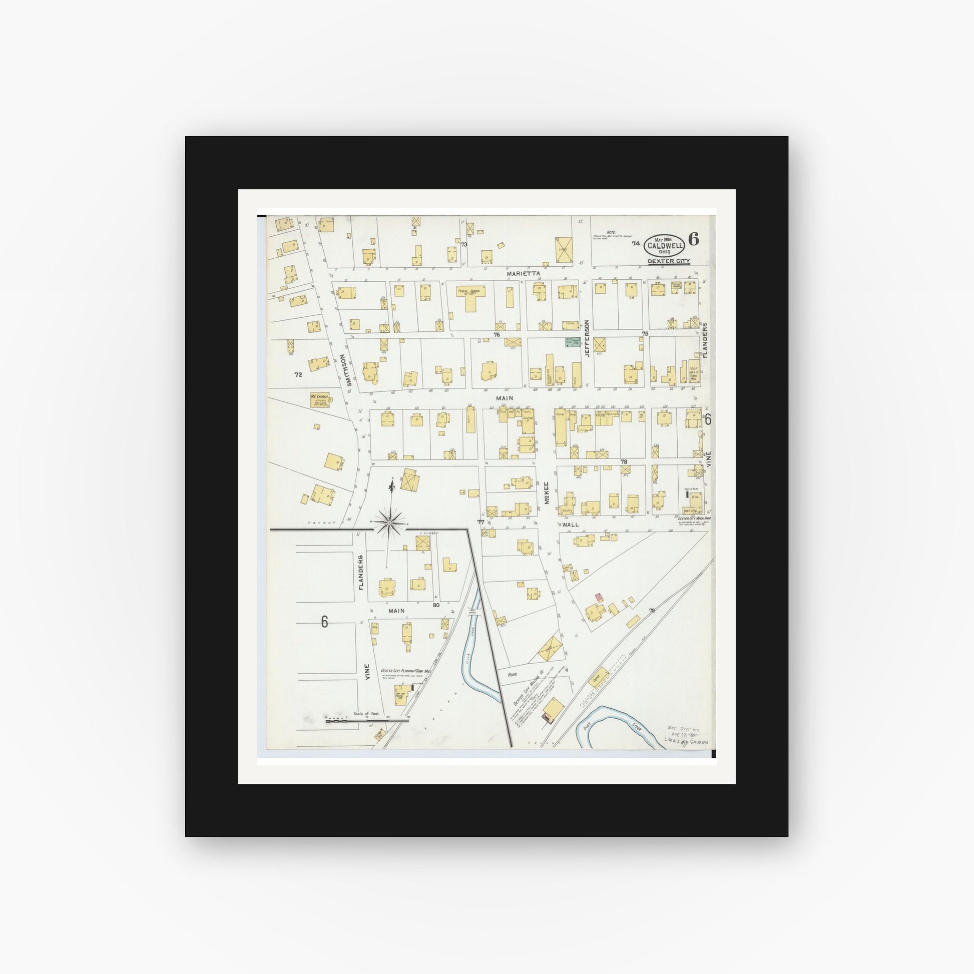 Old map wall art mockup — black gallery frame with white mat — Sanborn Fire Insurance Map from Caldwell, Noble County, Ohio (1905), Sheet #0006