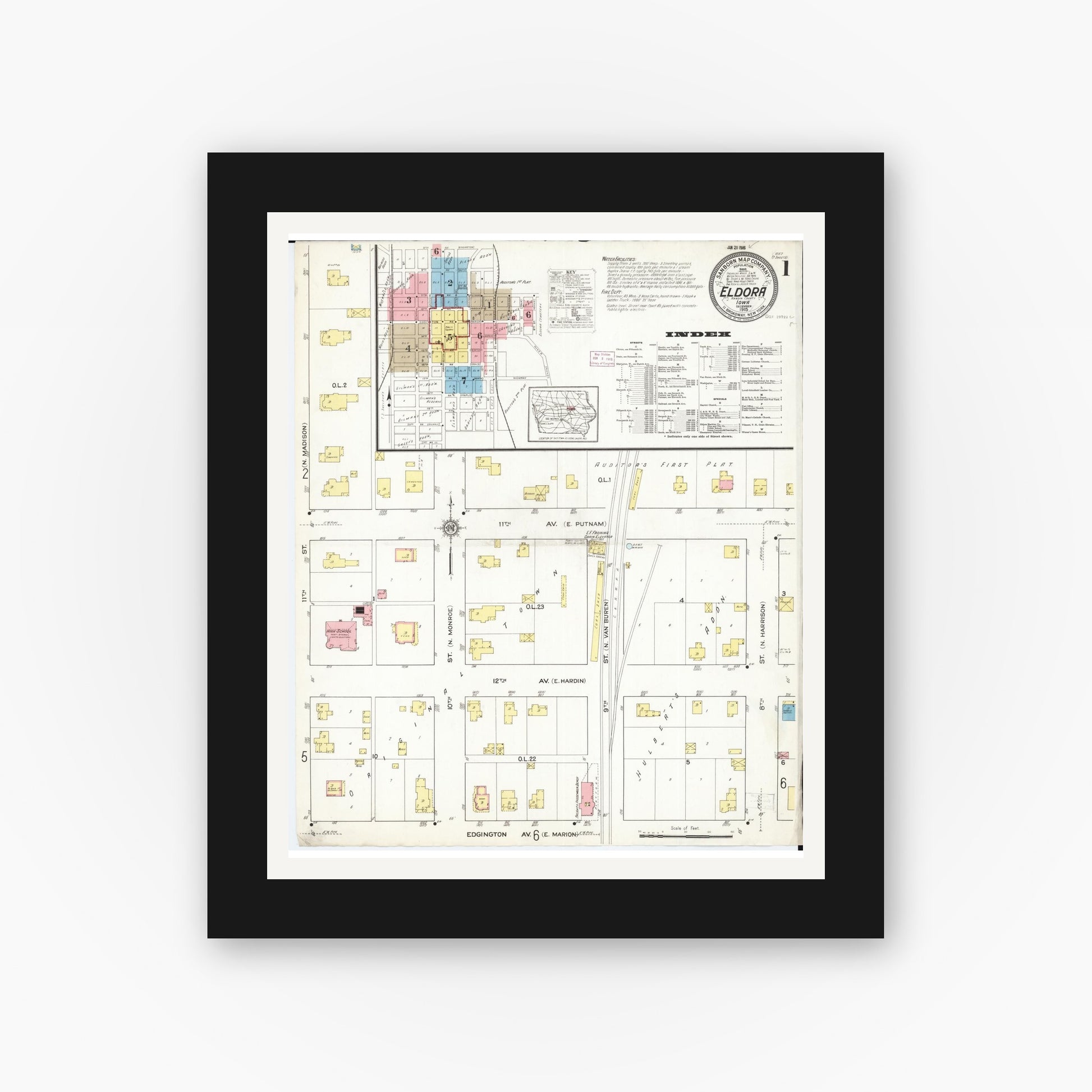 Old map wall art mockup — black gallery frame with white mat — Sanborn Fire Insurance Map from Eldora, Hardin County, Iowa (1915) â€” Complete Set