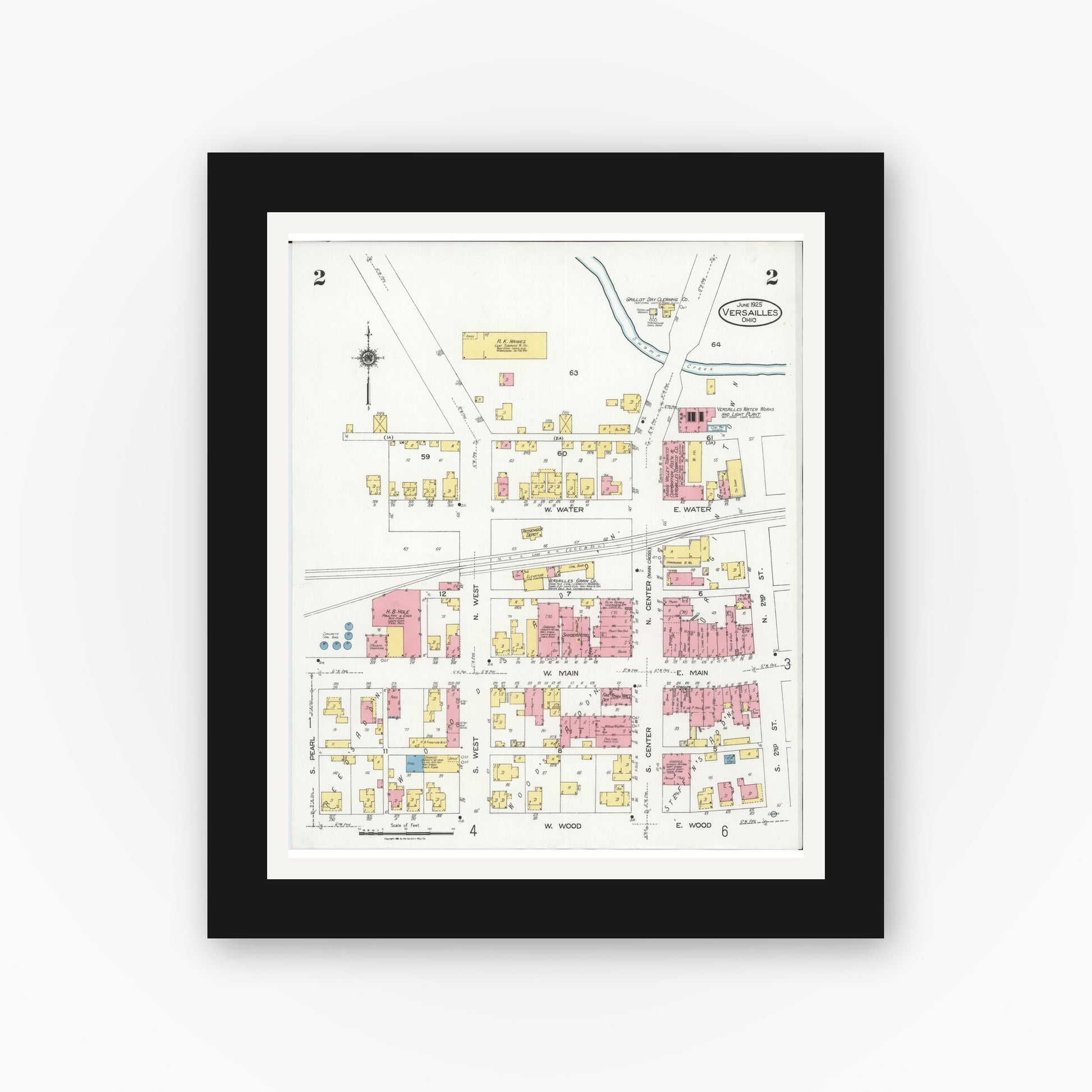 Old map wall art mockup — black gallery frame with white mat — Sanborn Fire Insurance Map from Versailles, Darke County, Ohio (1925), Sheet #0002