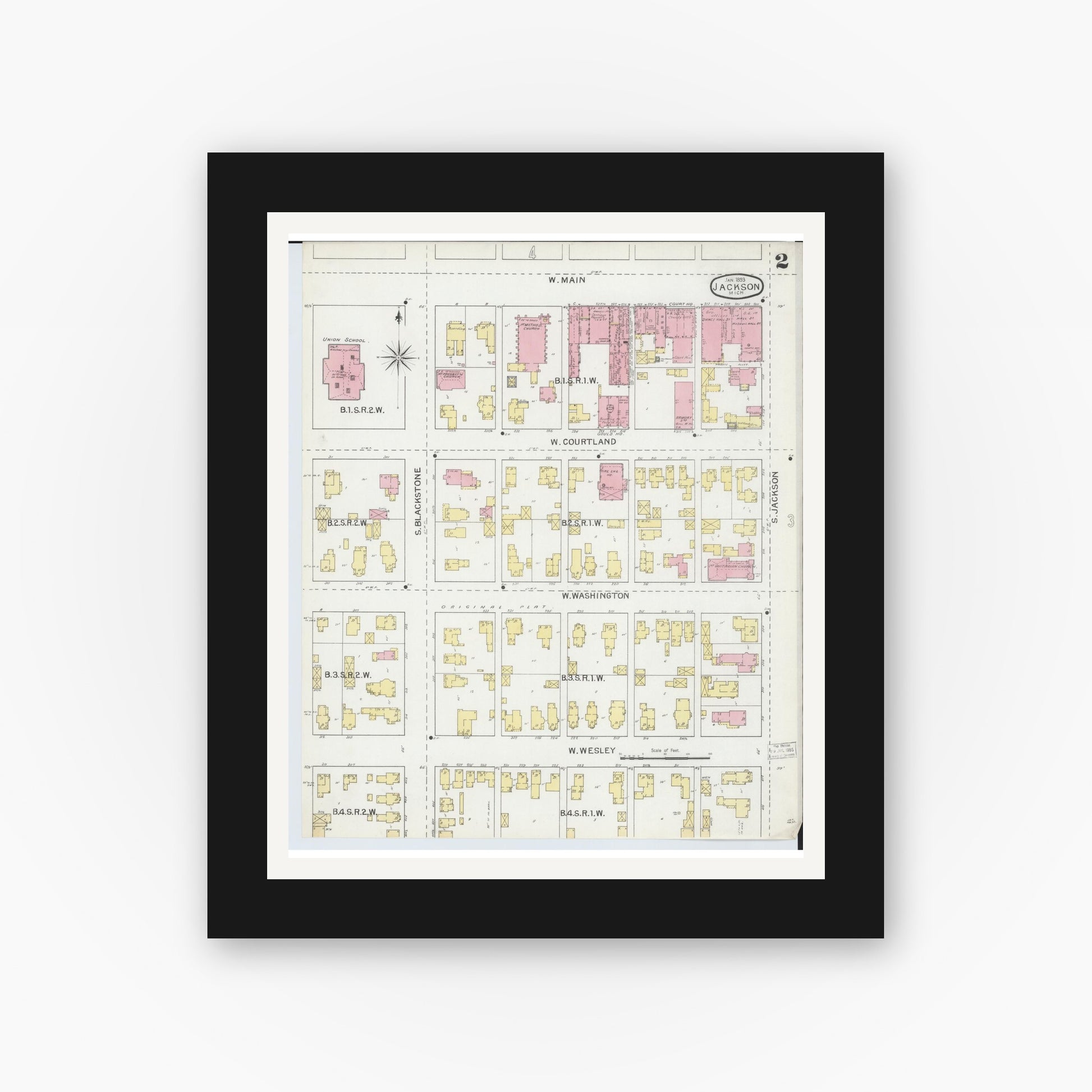 Old map wall art mockup — black gallery frame with white mat — Sanborn Fire Insurance Map from Jackson, Jackson County, Michigan (1893), Sheet #0002