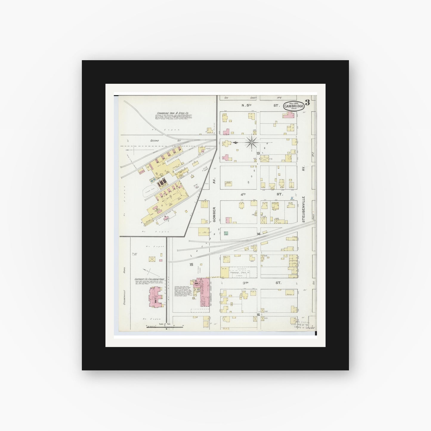 Old map wall art mockup — black gallery frame with white mat — Sanborn Fire Insurance Map from Cambridge, Guernsey County, Ohio (1892), Sheet #0003