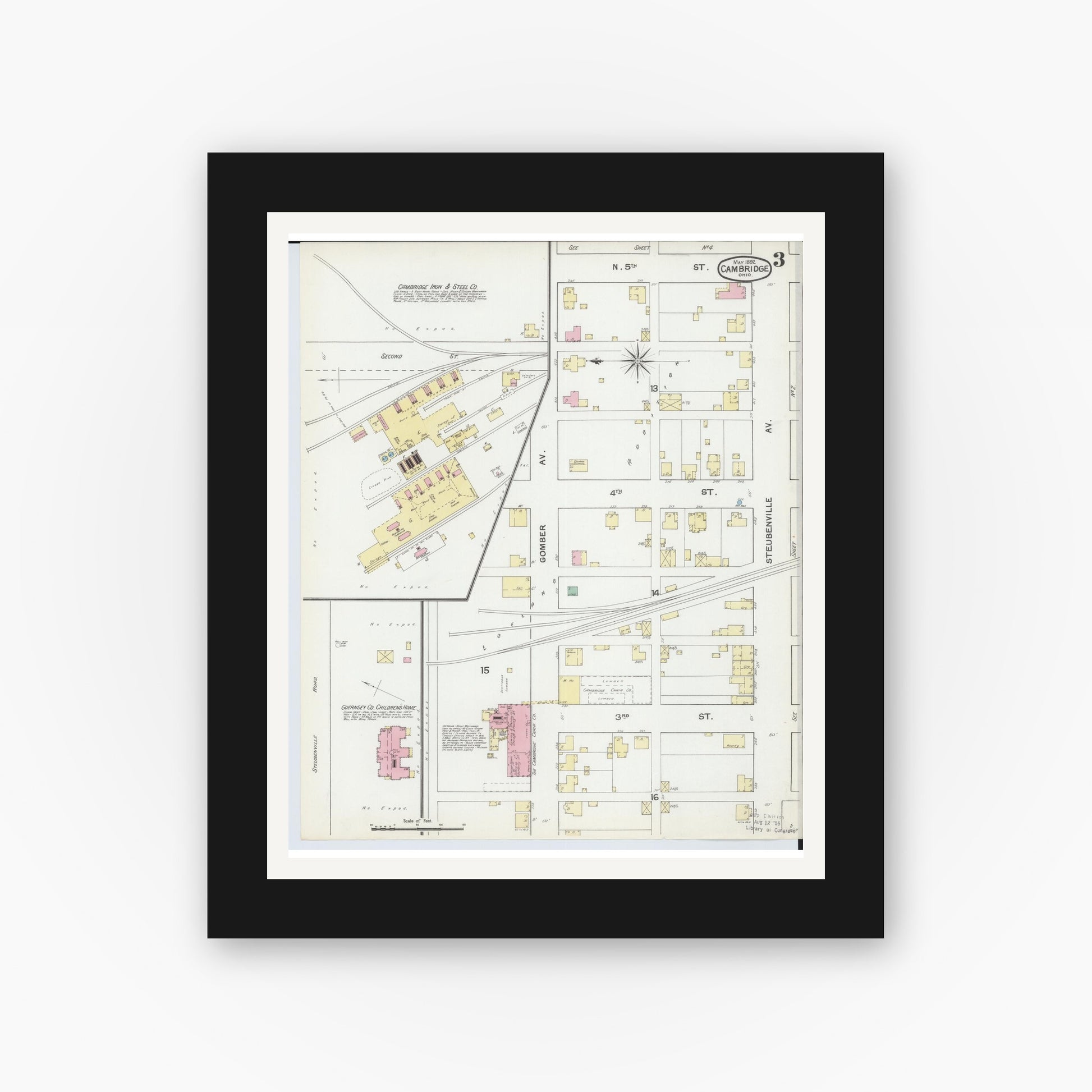 Old map wall art mockup — black gallery frame with white mat — Sanborn Fire Insurance Map from Cambridge, Guernsey County, Ohio (1892), Sheet #0003